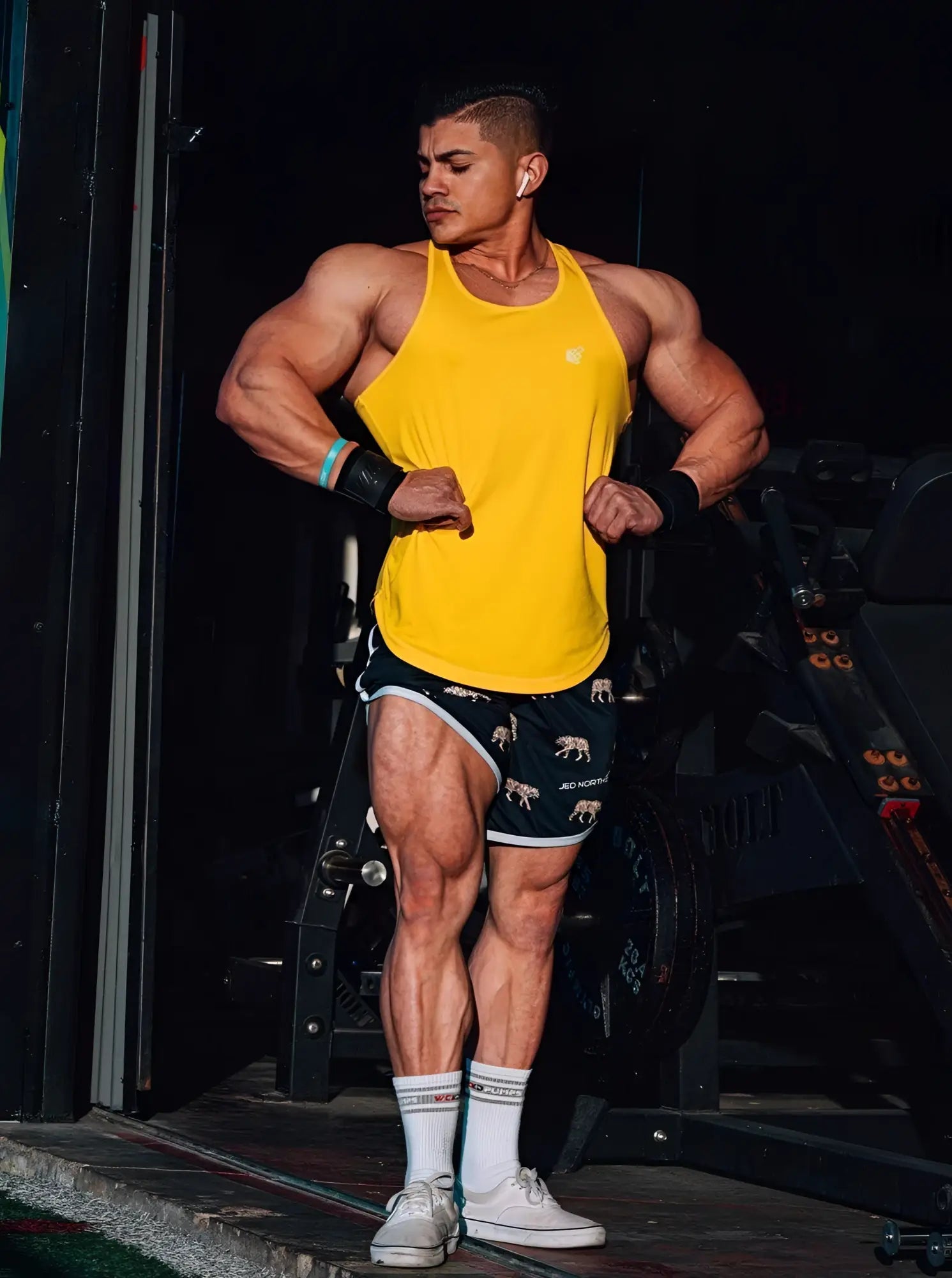 Yellow sleeveless jed north fast dry bodybuilding workout stringer with small chest logo for gym training