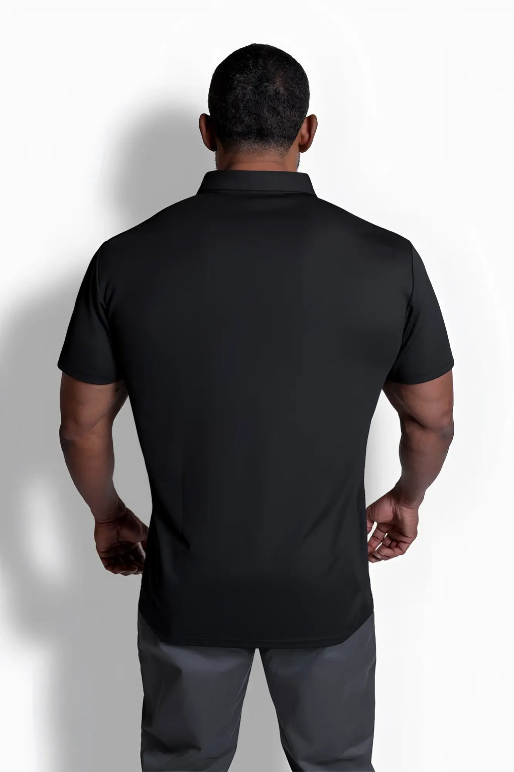 Black fast-dry polo t-shirt with short sleeves and classic collar designed for a tailored fit