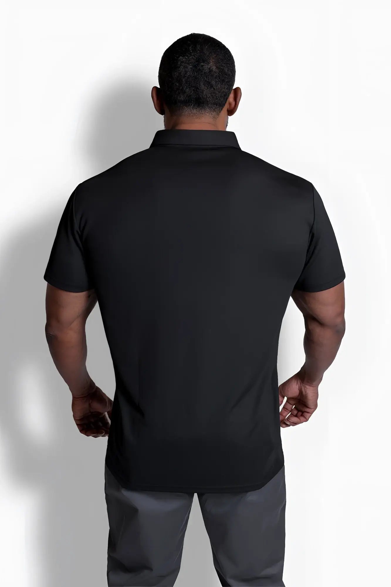 Black fast-dry polo t-shirt with short sleeves and classic collar designed for a tailored fit