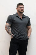 Dark gray fast-dry short-sleeved polo shirt with classic collar and subtle chest branding for casual wear