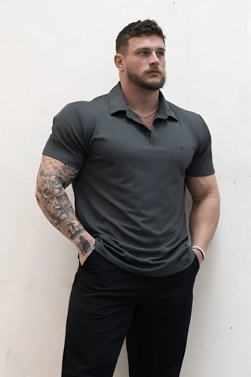 Dark gray fast-dry short-sleeved polo shirt with classic collar and subtle chest branding for casual wear
