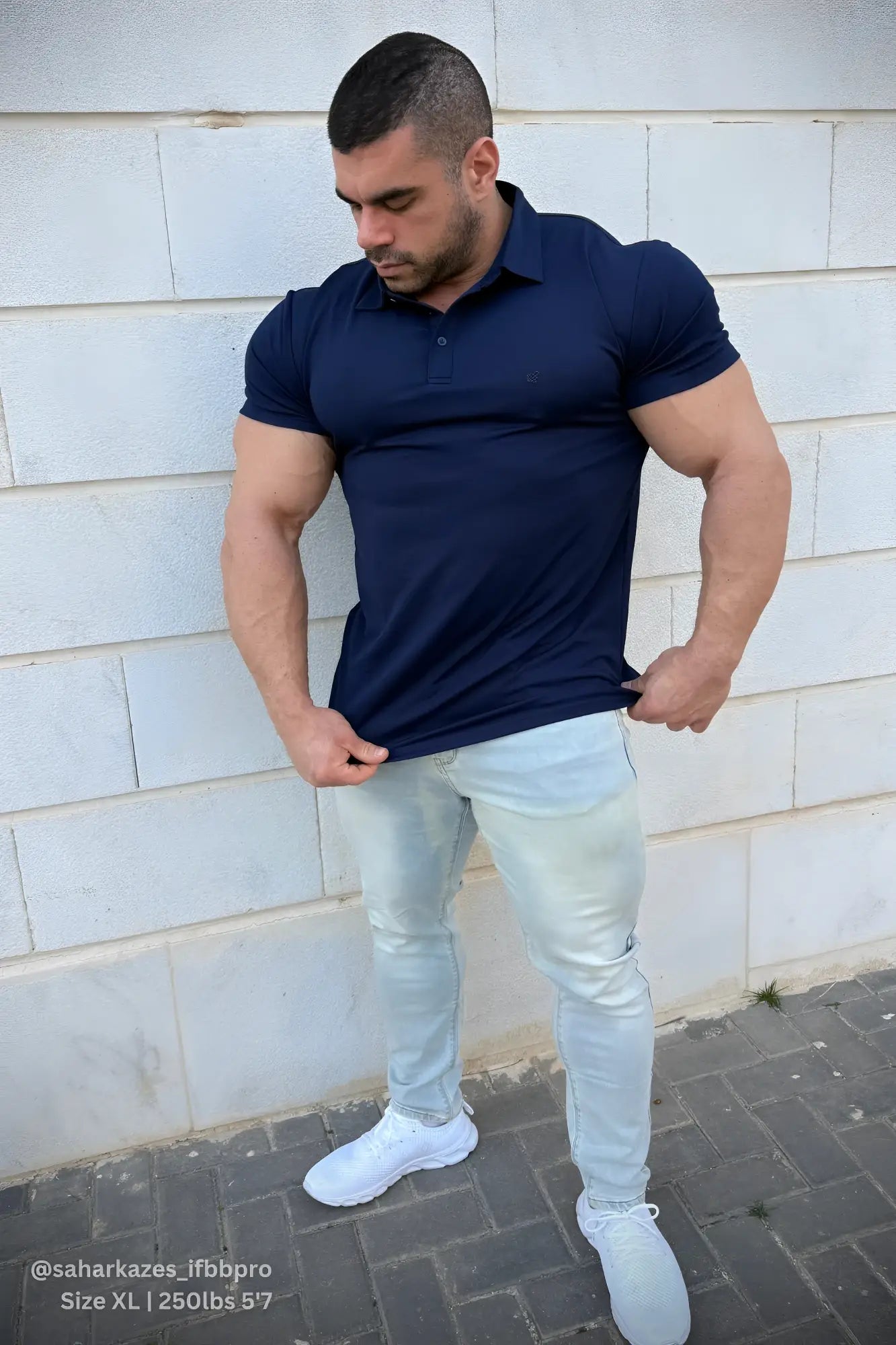Navy fast-dry polo t-shirt with short sleeves collar and button placket ideal for active wear and casual use