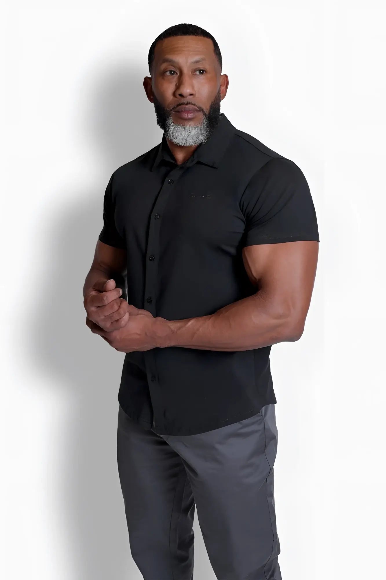 Flex premium stretch button-up shirt in onyx black with short sleeves and modern sleek design for comfortable wear