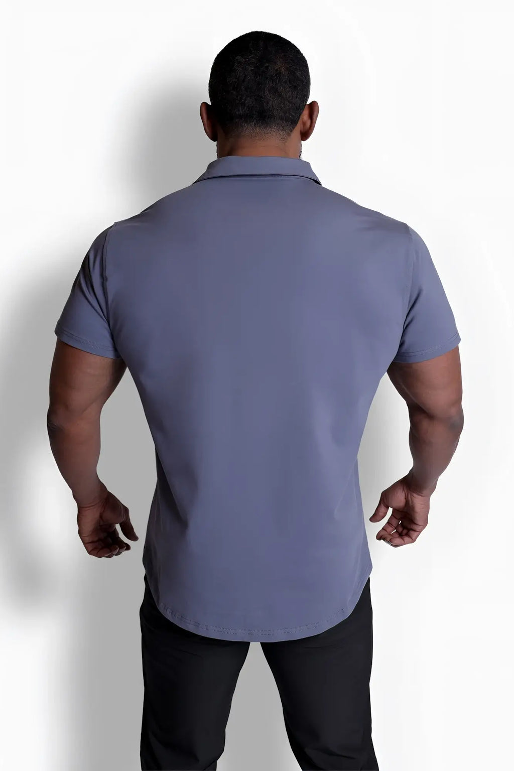 A sleek slate-blue short-sleeved polo shirt with a classic collar and tailored fit from flex premium stretch collection