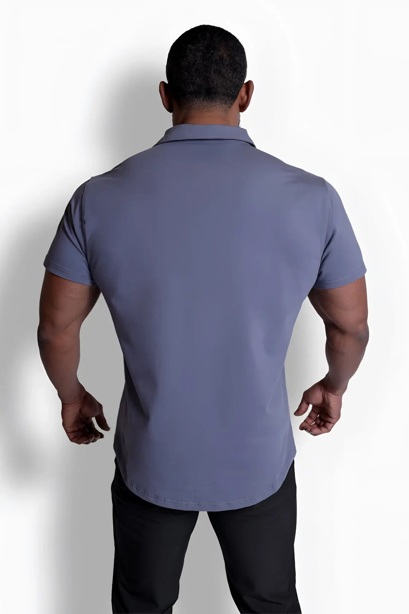 A sleek slate-blue short-sleeved polo shirt with a classic collar and tailored fit from flex premium stretch collection