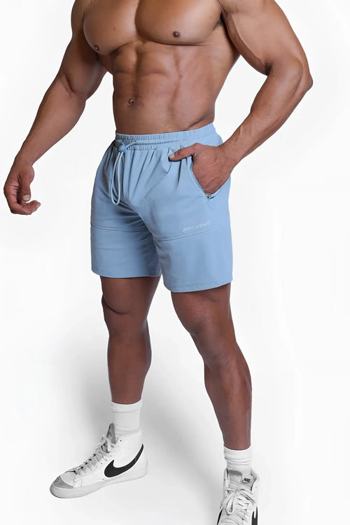 Fortis men’s athletic shorts in light blue with a drawstring waistband and side pockets for comfortable wear