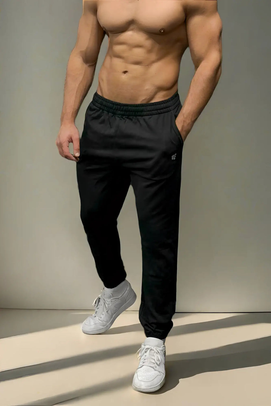 Black jed north french terry athletic training joggers with subtle logo on left thigh for workout and casual wear