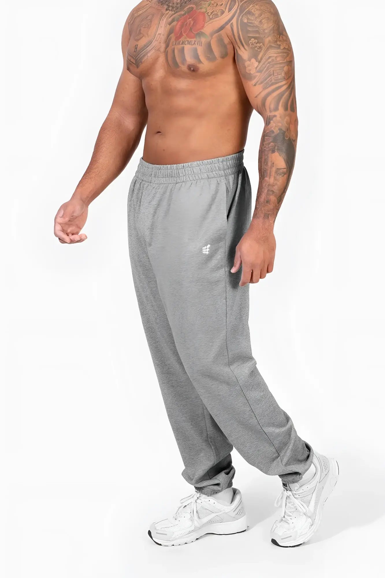 Gray heathered french terry athletic training joggers by jed north with small white logo on left thigh