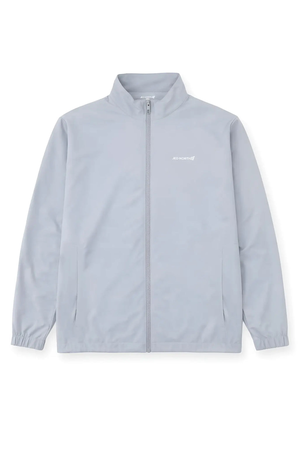 Light gray Carhartt WIP full-zip training jacket with subtle embroidered chest logo in silver color