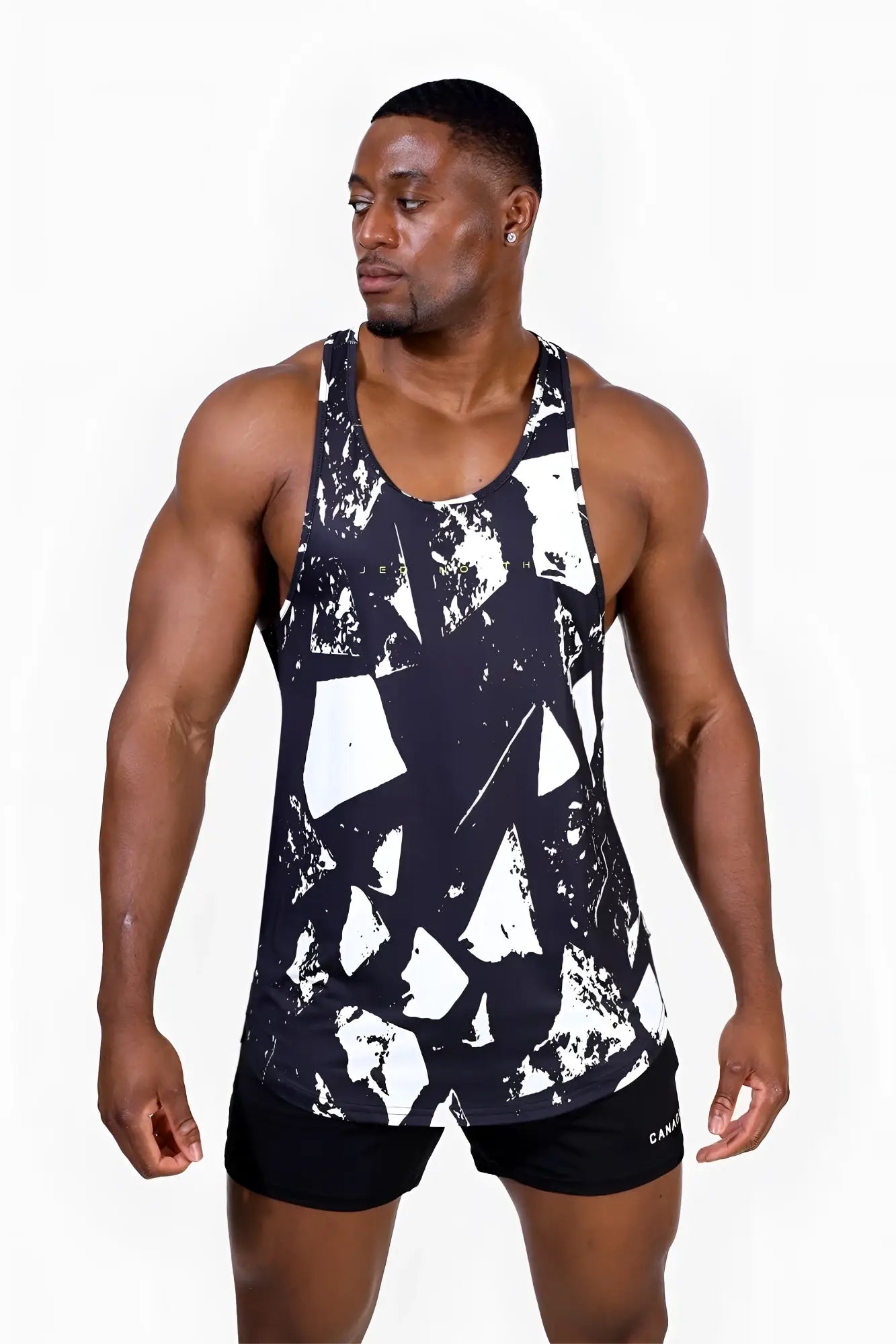 Abstract black graphic muscle stringer tank top with black and white geometric pattern and lightweight fabric