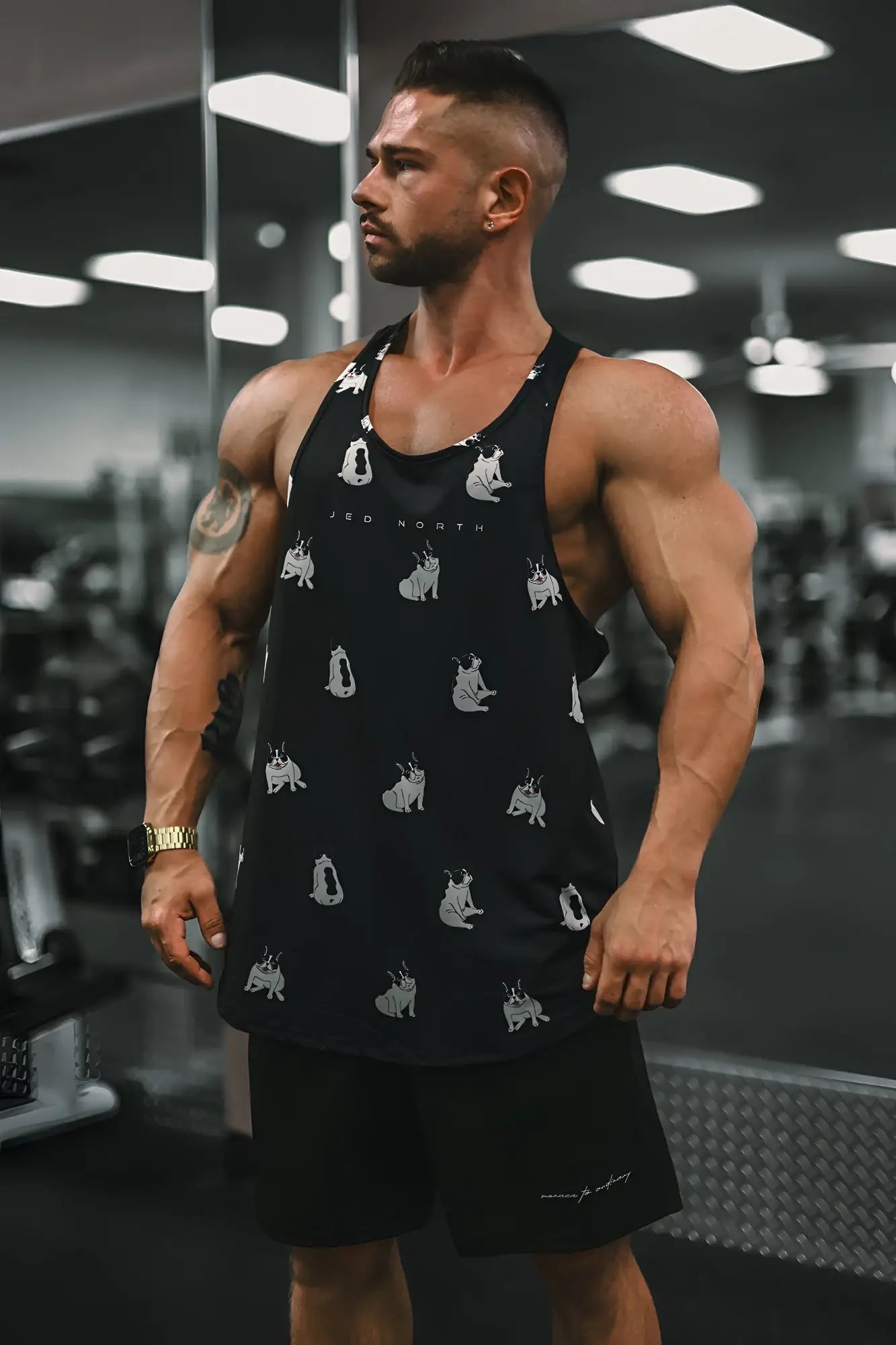 Black graphic muscle stringer tank top with white dog illustrations and jeo north text on the chest