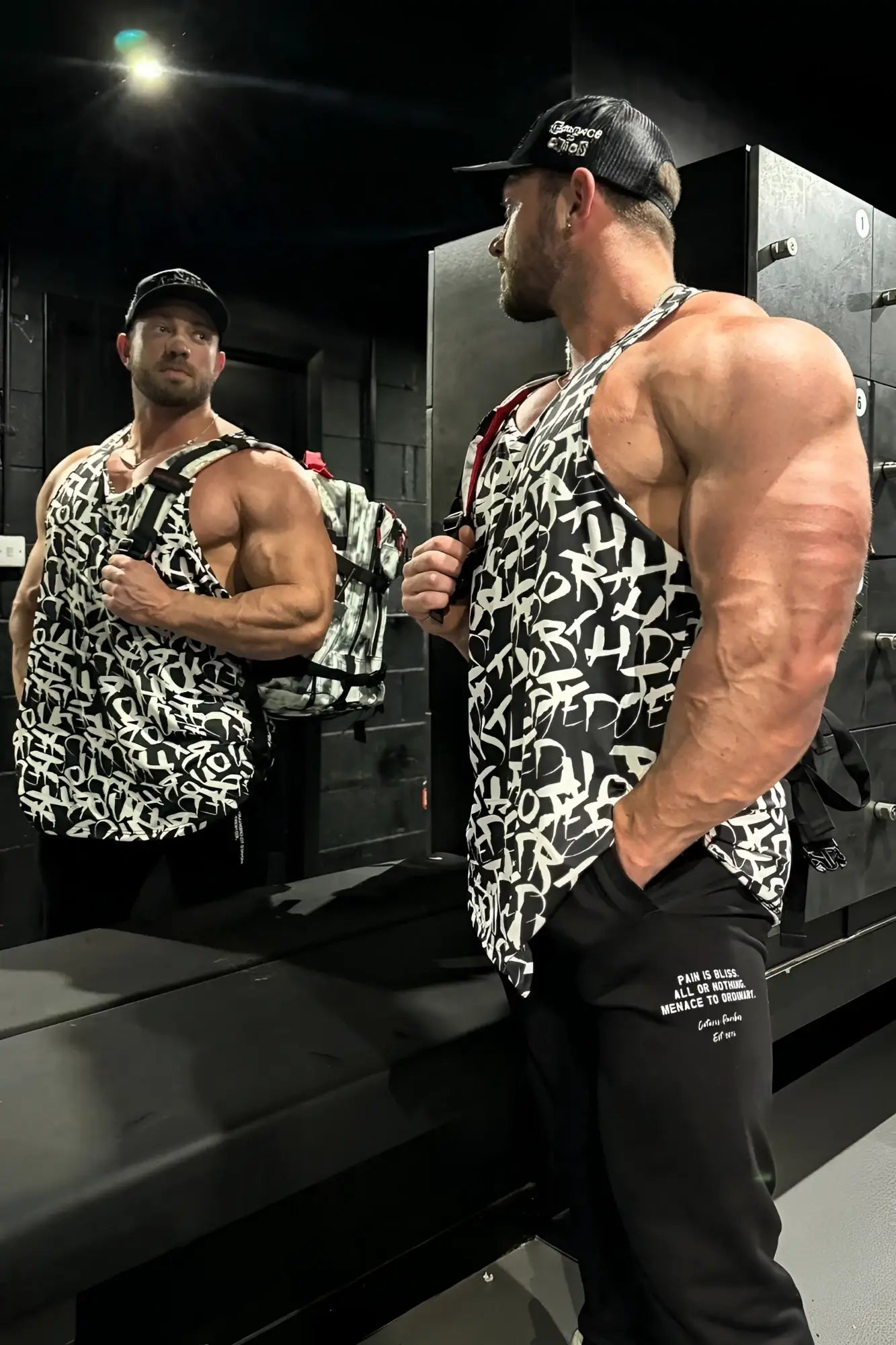 Jed north graphic muscle stringer chaotic black tank top with black and white graffiti pattern and mesh texture