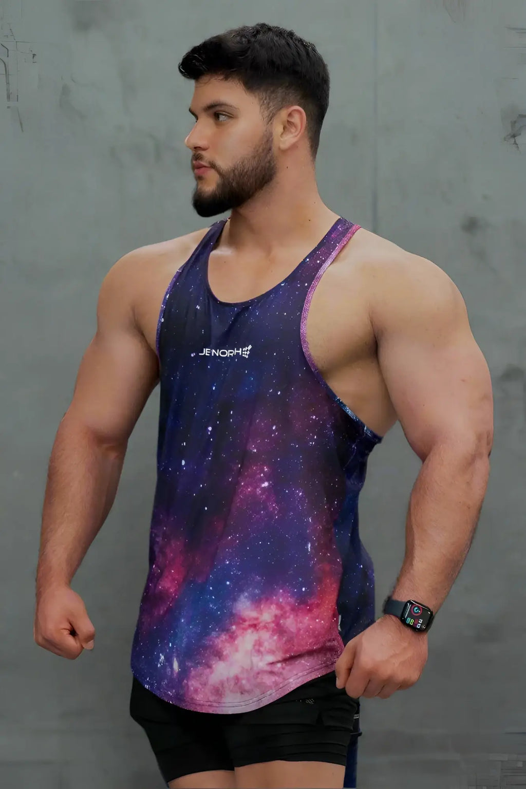 Jed North graphic muscle stringer tank top with vibrant galaxy-themed cosmic nebula print in purples pinks and blues