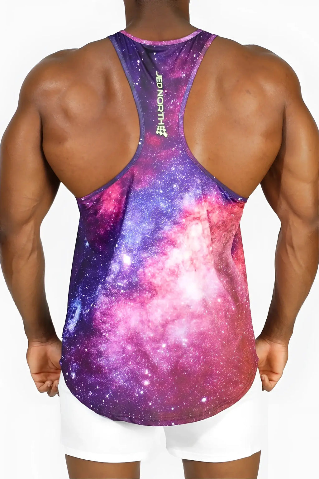 Jed north graphic muscle stringer galactic tank top with vibrant purple and pink galaxy nebula print and star details