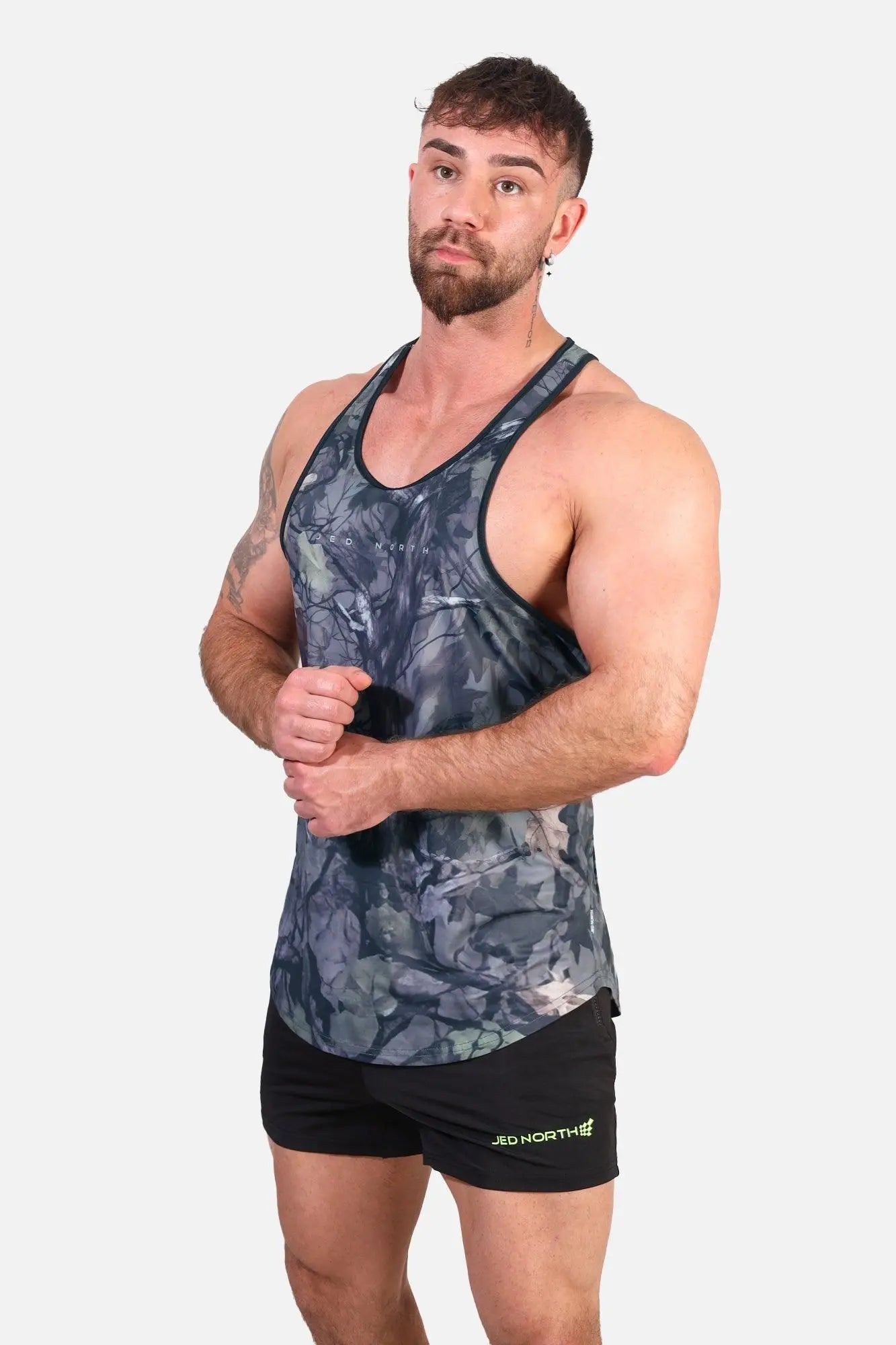 Jed North graphic muscle stringer hunter camo athletic tank top with dark gray and black camouflage racerback design