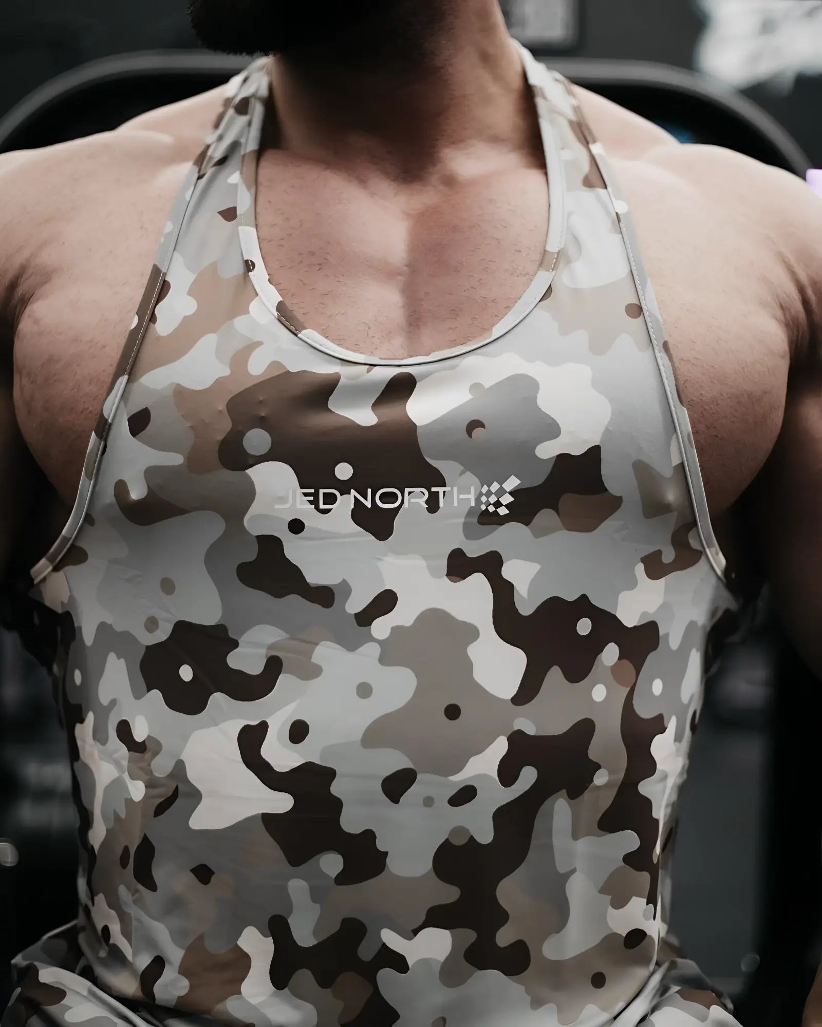 Jed North graphic muscle stringer men’s camouflage tank top in khaki camo tones with logo across the chest