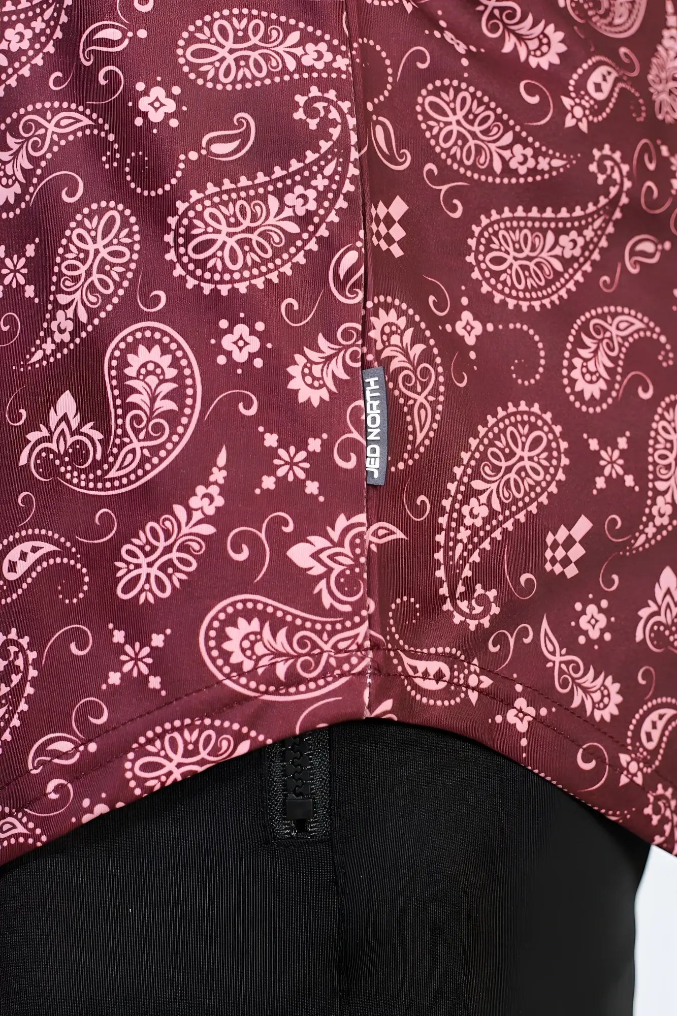 Jed north graphic muscle stringer in maroon with white paisley bandana pattern and floral motifs with brand tag