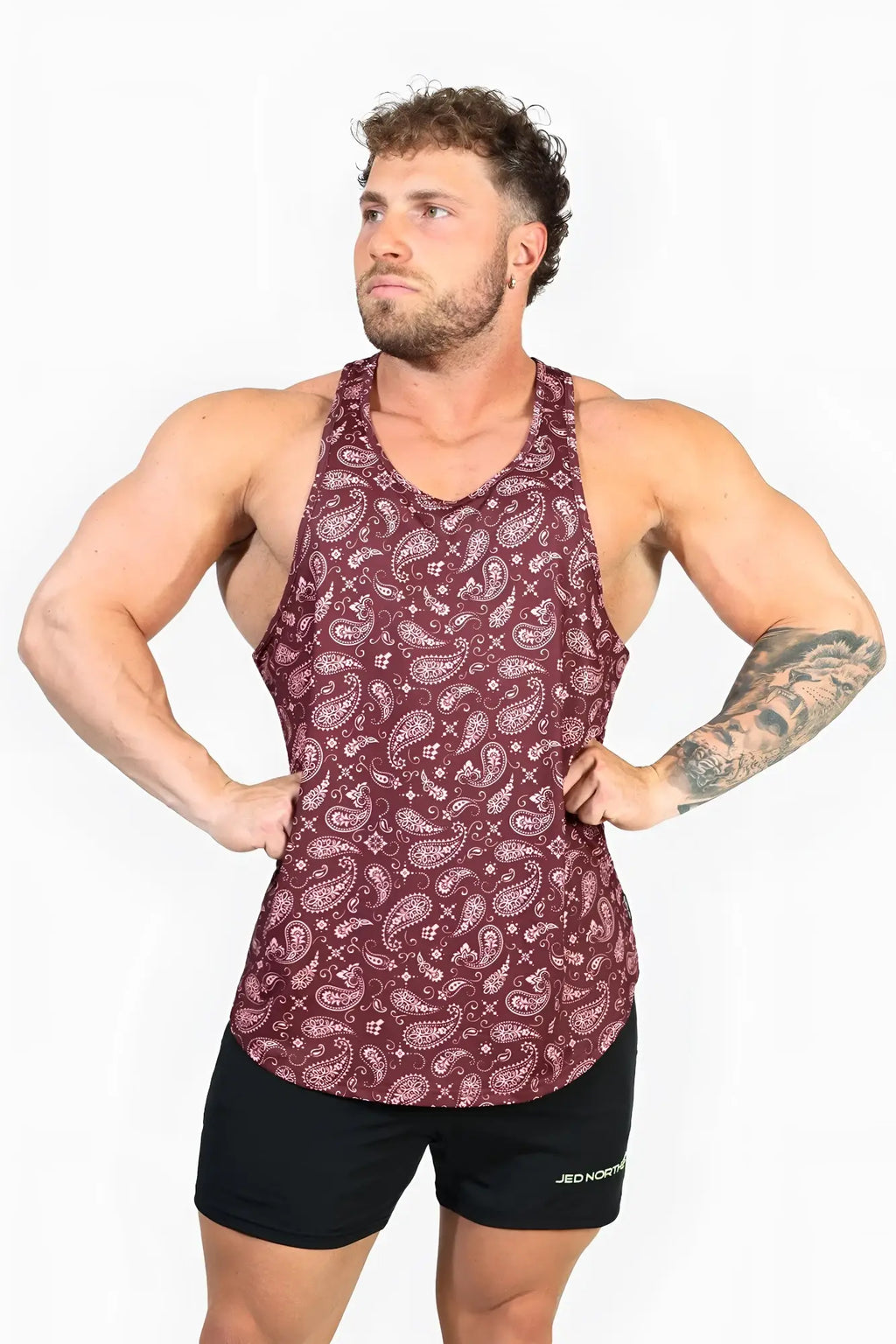 Maroon paisley patterned Jed North graphic muscle stringer tank top with v neck and racerback design front view