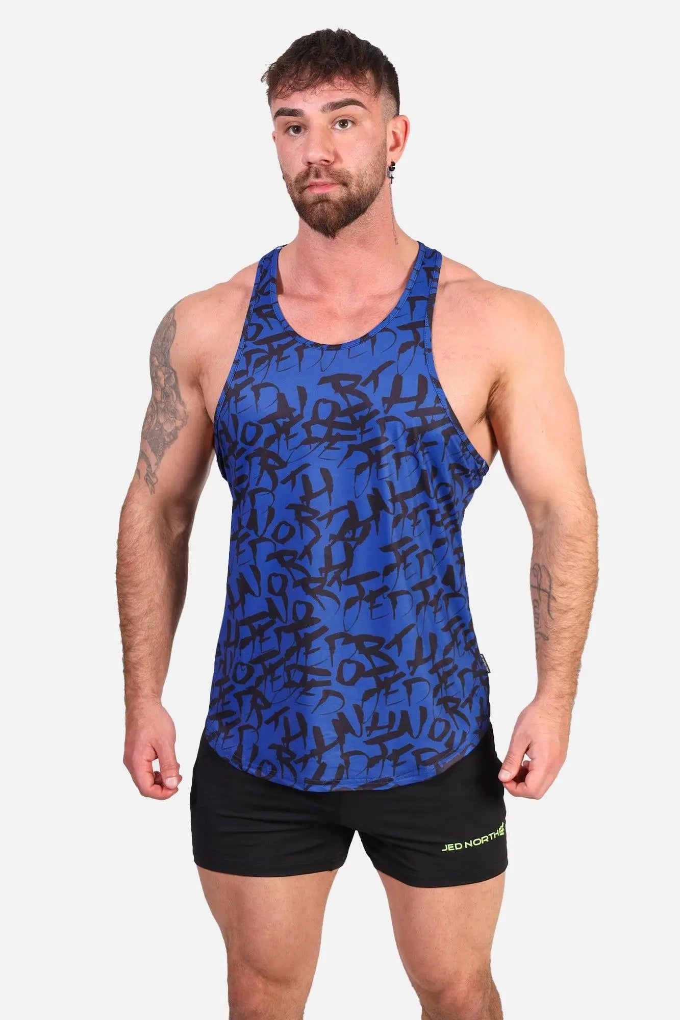 Blue athletic tank top with black graffiti style lettering pattern jed north graphic muscle stringer navy graffiti
