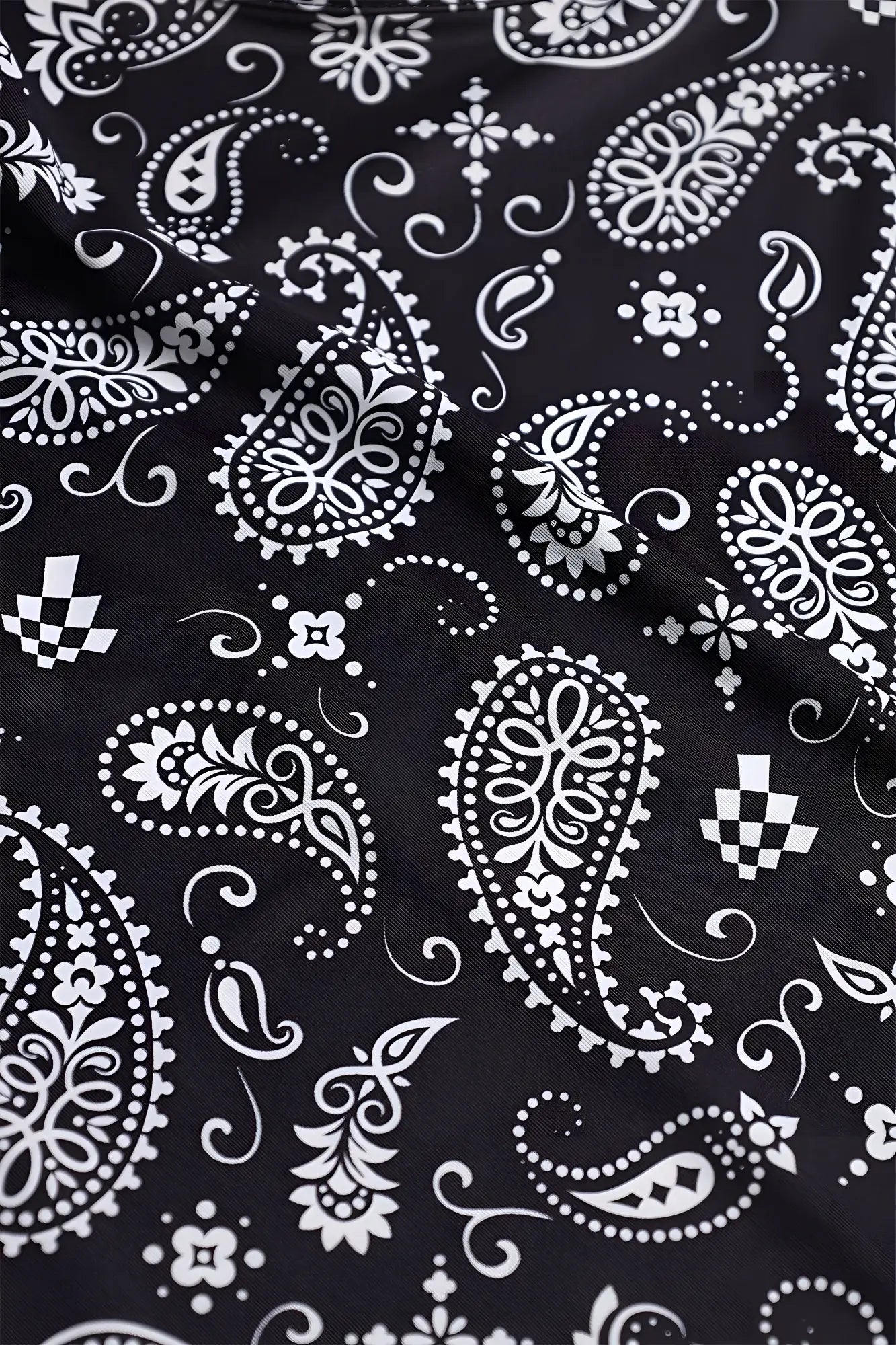 Graphic muscle stringer with black fabric and white paisley floral pattern perfect for casual wear