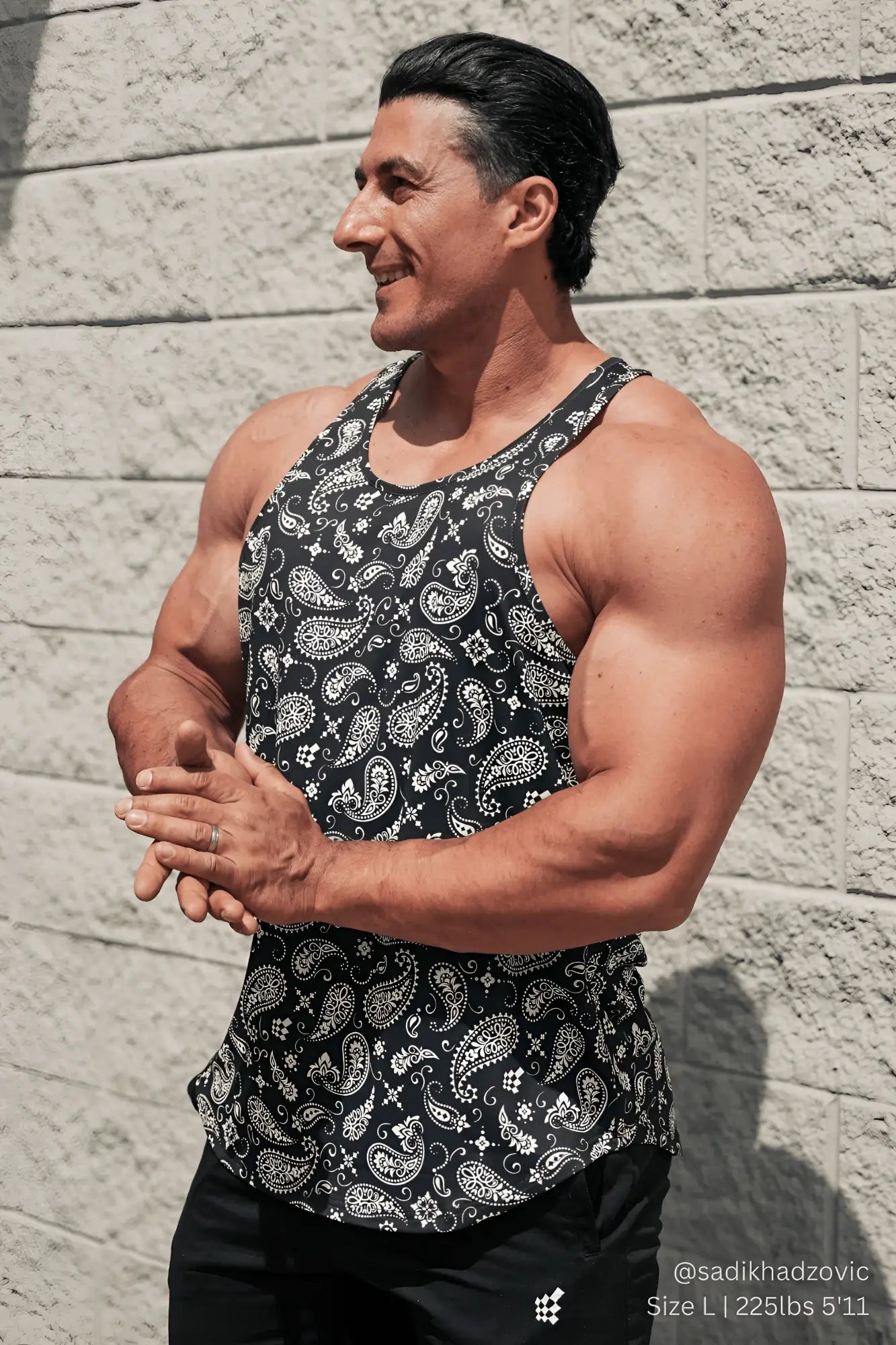 Black tank top muscle stringer with white paisley pattern perfect for casual and workout wear