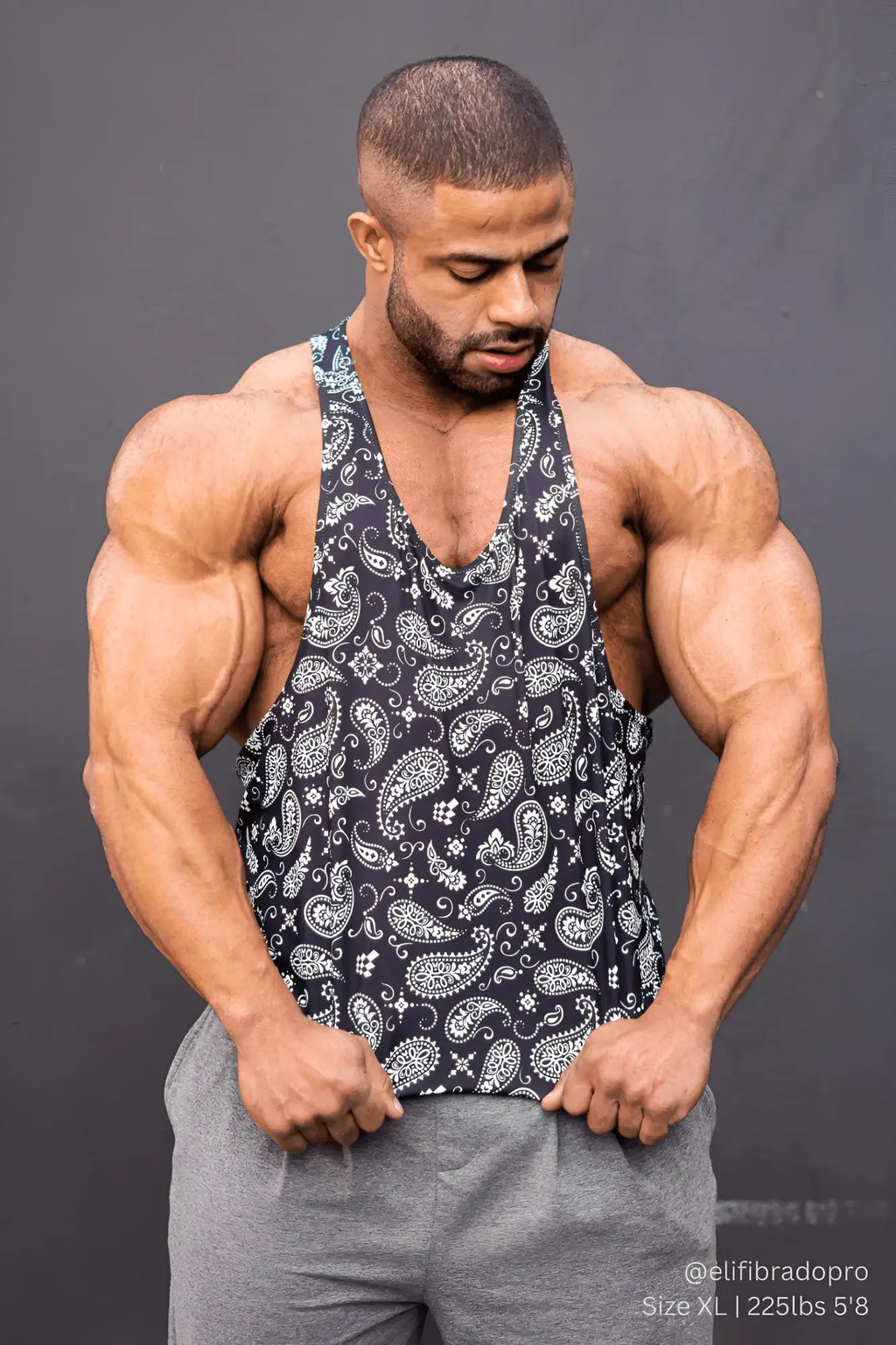 Black and white paisley patterned graphic muscle stringer tank top with breathable fabric for casual wear