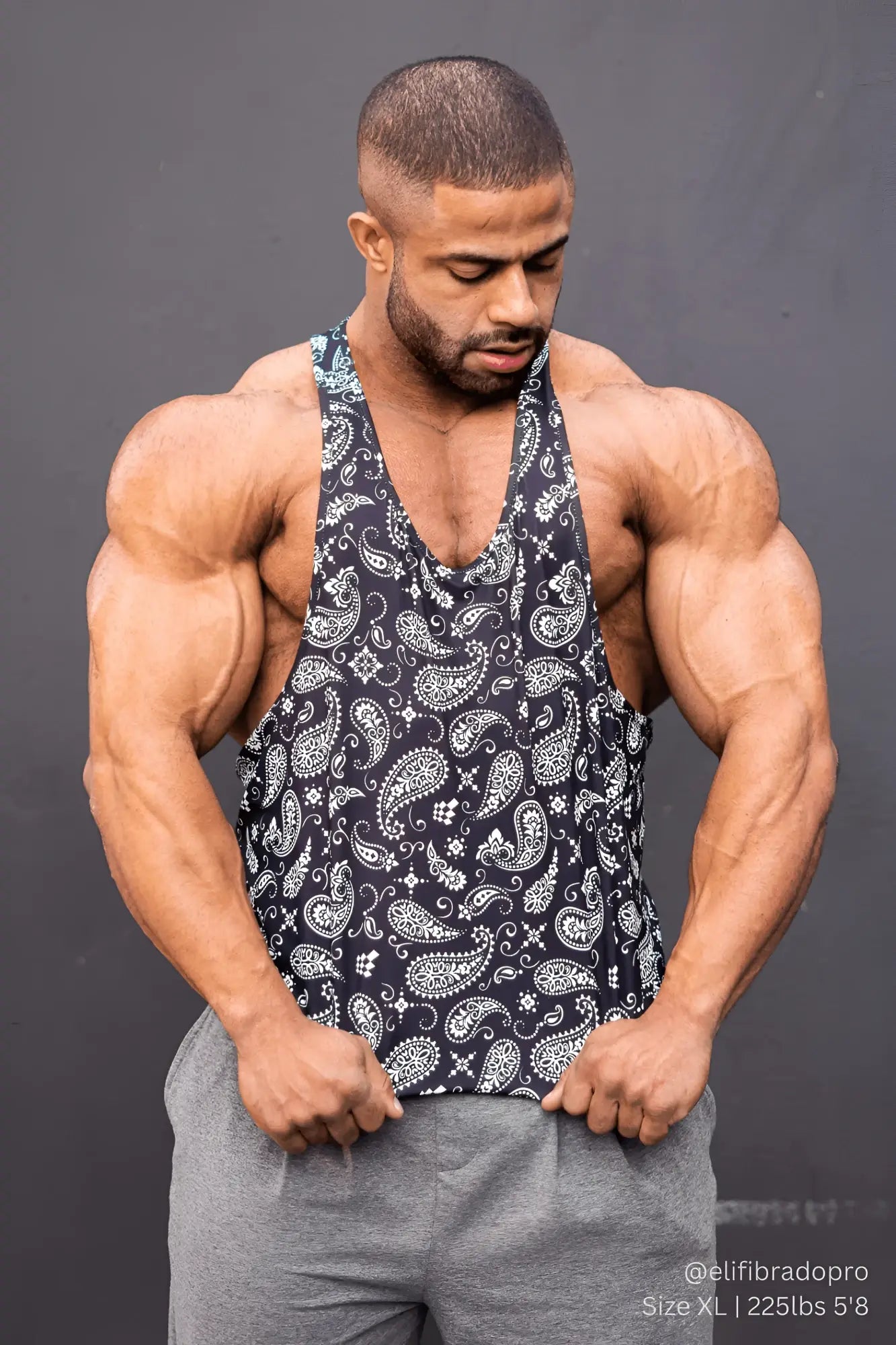Black and white paisley patterned graphic muscle stringer tank top with breathable fabric for casual wear