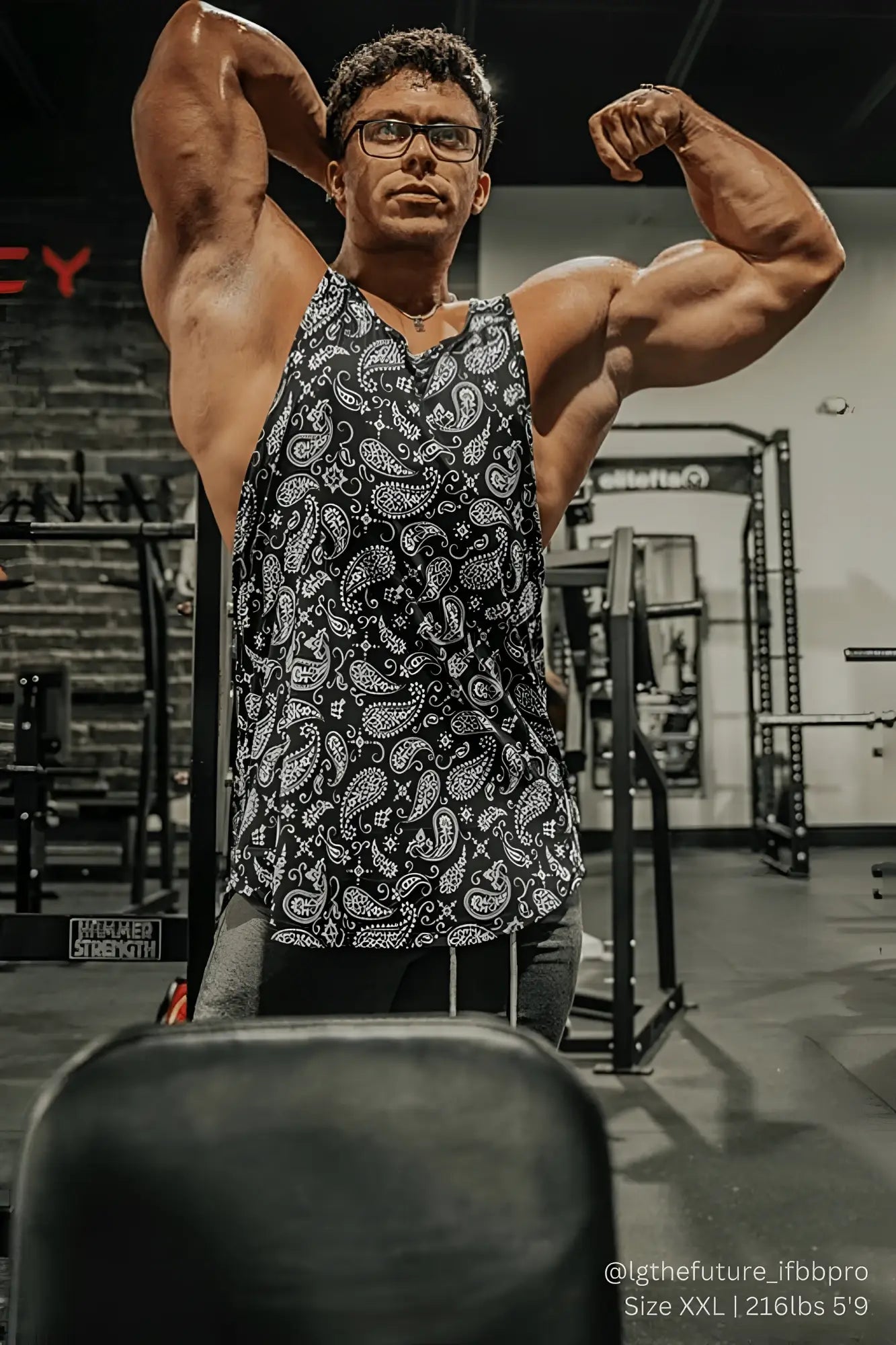 Black and white paisley patterned graphic muscle stringer tank top with a sleeveless design and breathable fabric