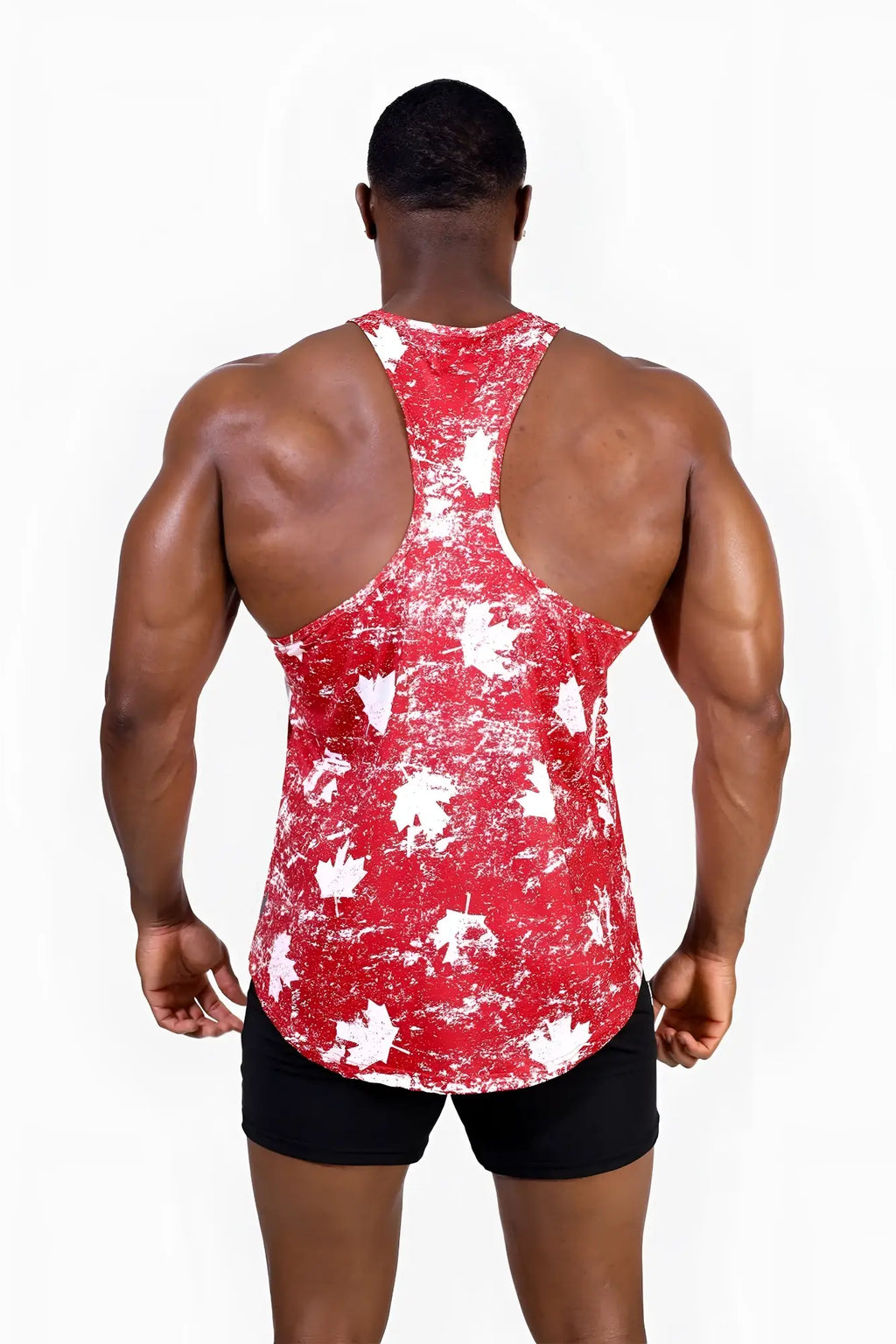 Red and white maple leaf patterned graphic muscle stringer tank top for athletic use