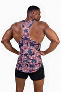 A muscular man wearing the back side of a fitted graphic muscle stringer tank top with usa flag colors red white and blue