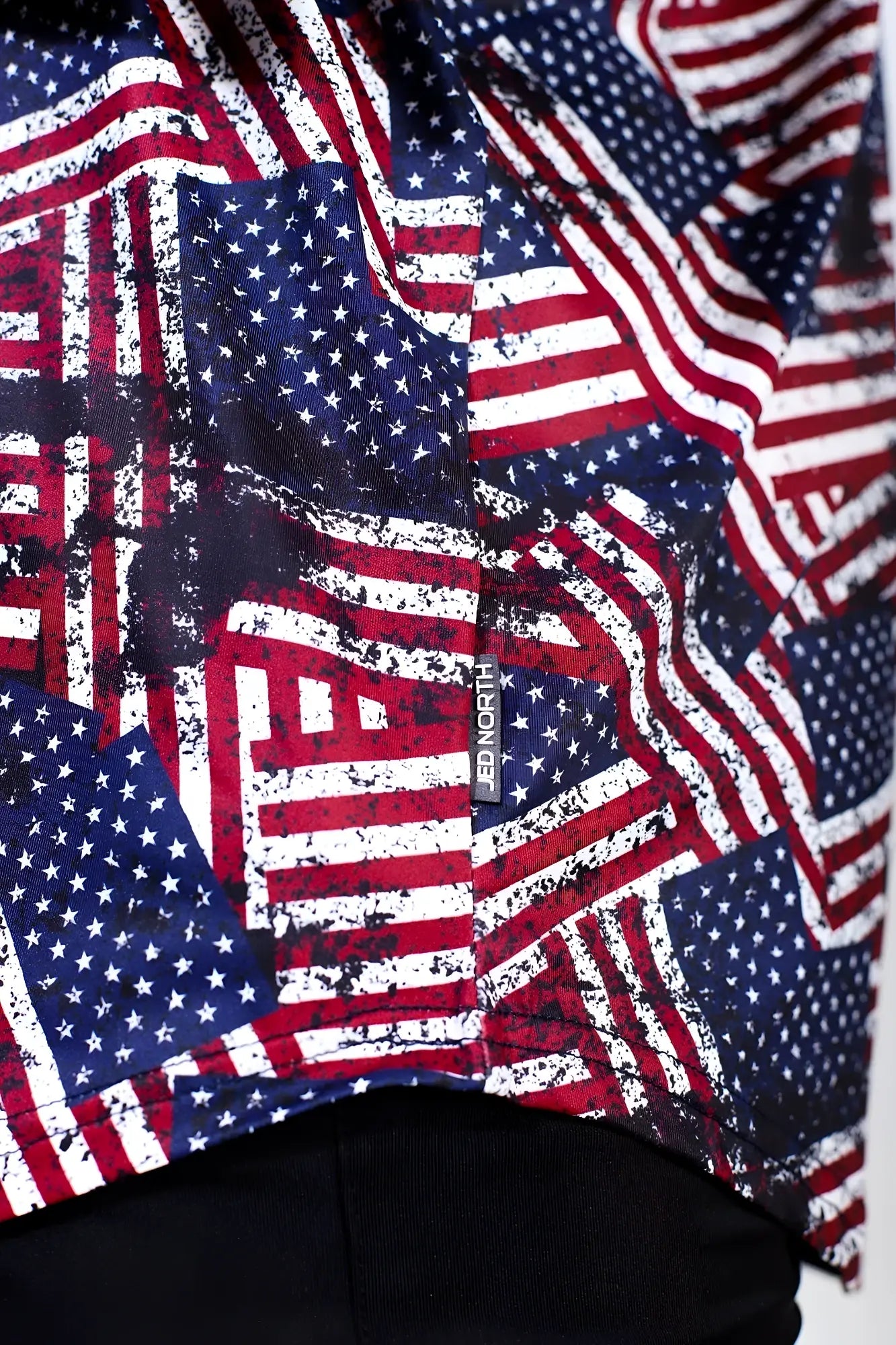 Graphic muscle stringer usa flag shirt in red white and blue with distressed american flag print and textured fabric finish