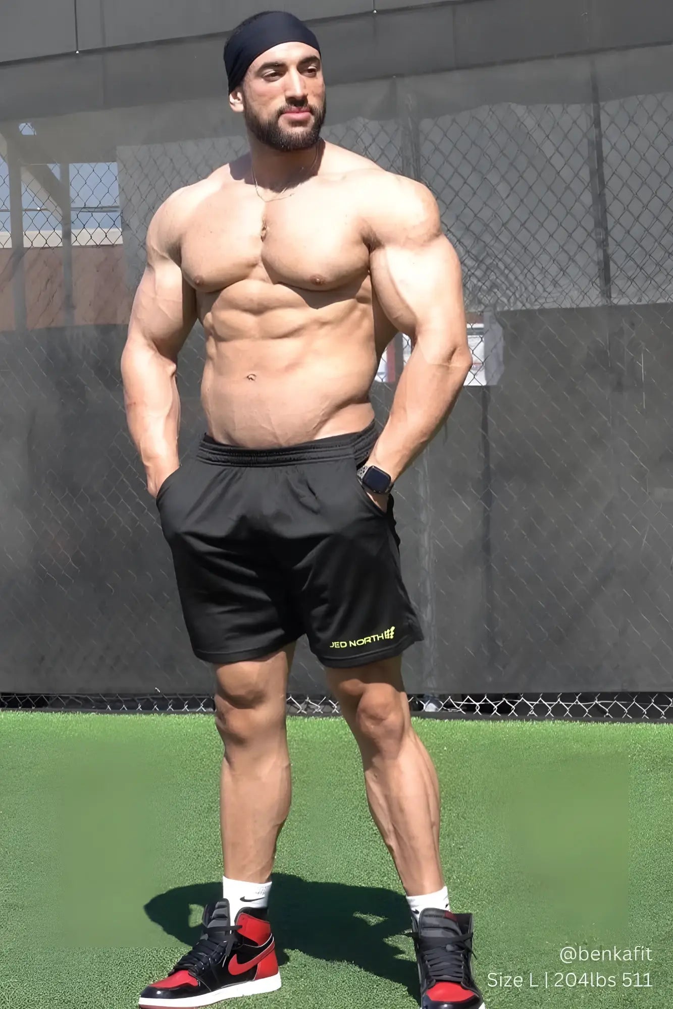 Jed North Jersey Mesh 7.5 inch black gym shorts with subtle yellow logo on lower right leg made of breathable mesh