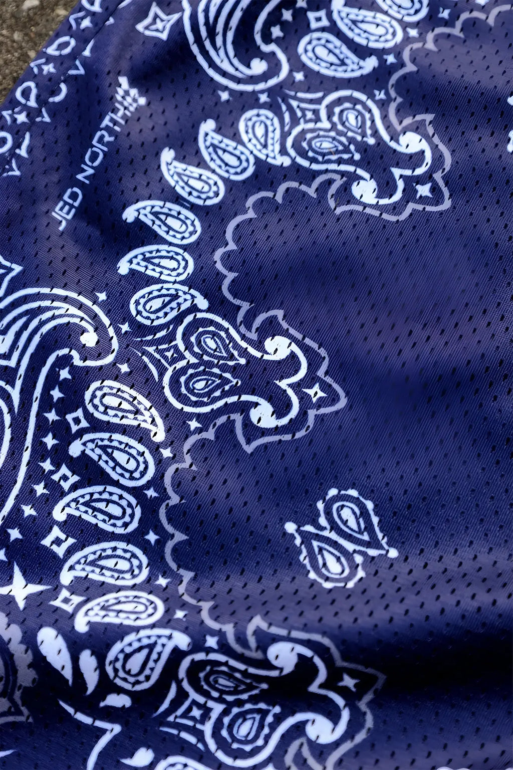 Jed north jersey mesh 7.5 inch navy gym shorts with blue mesh bandana featuring white paisley star patterns and branding