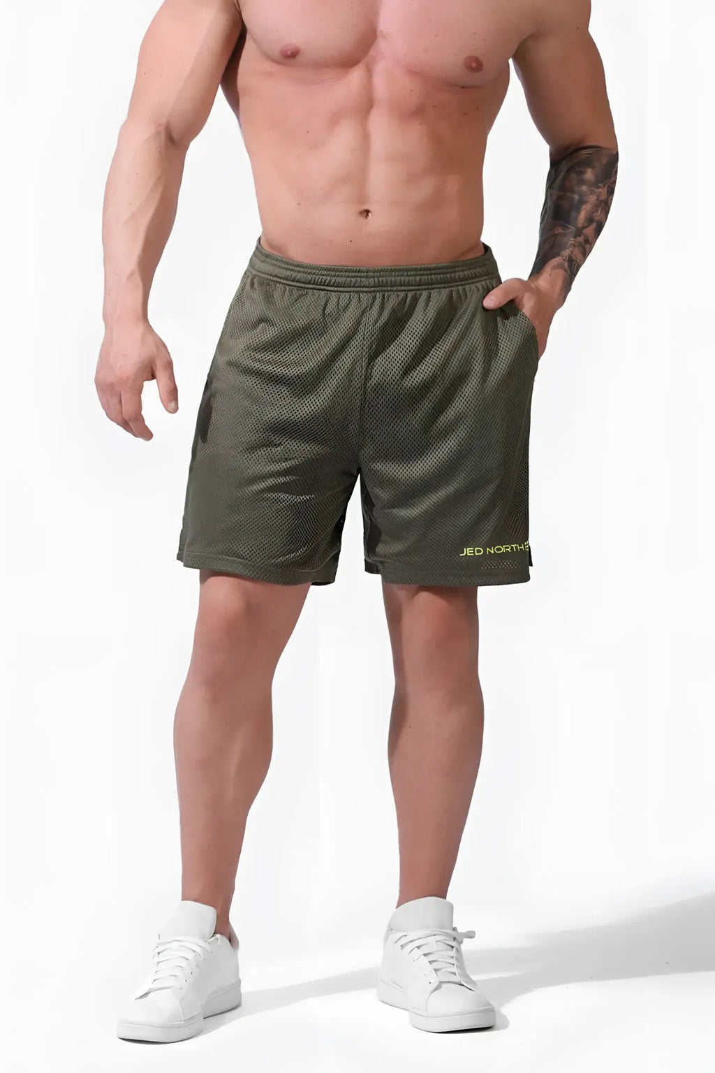 Jed North Jersey Mesh 7.5 inch gym shorts in olive with mesh fabric and a subtle neon yellow logo on the lower right leg