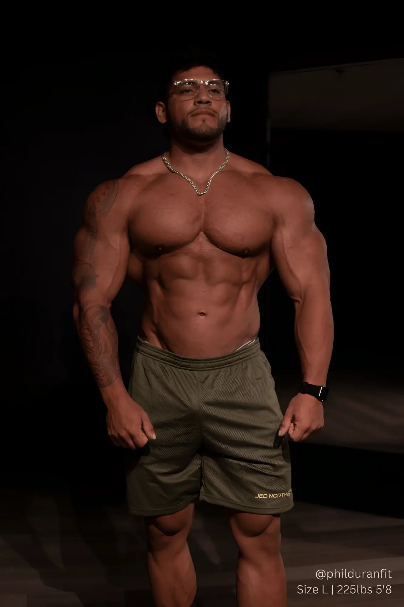 Olive green jed north jersey mesh 75 inch gym shorts featuring breathable mesh fabric and branding on lower right leg