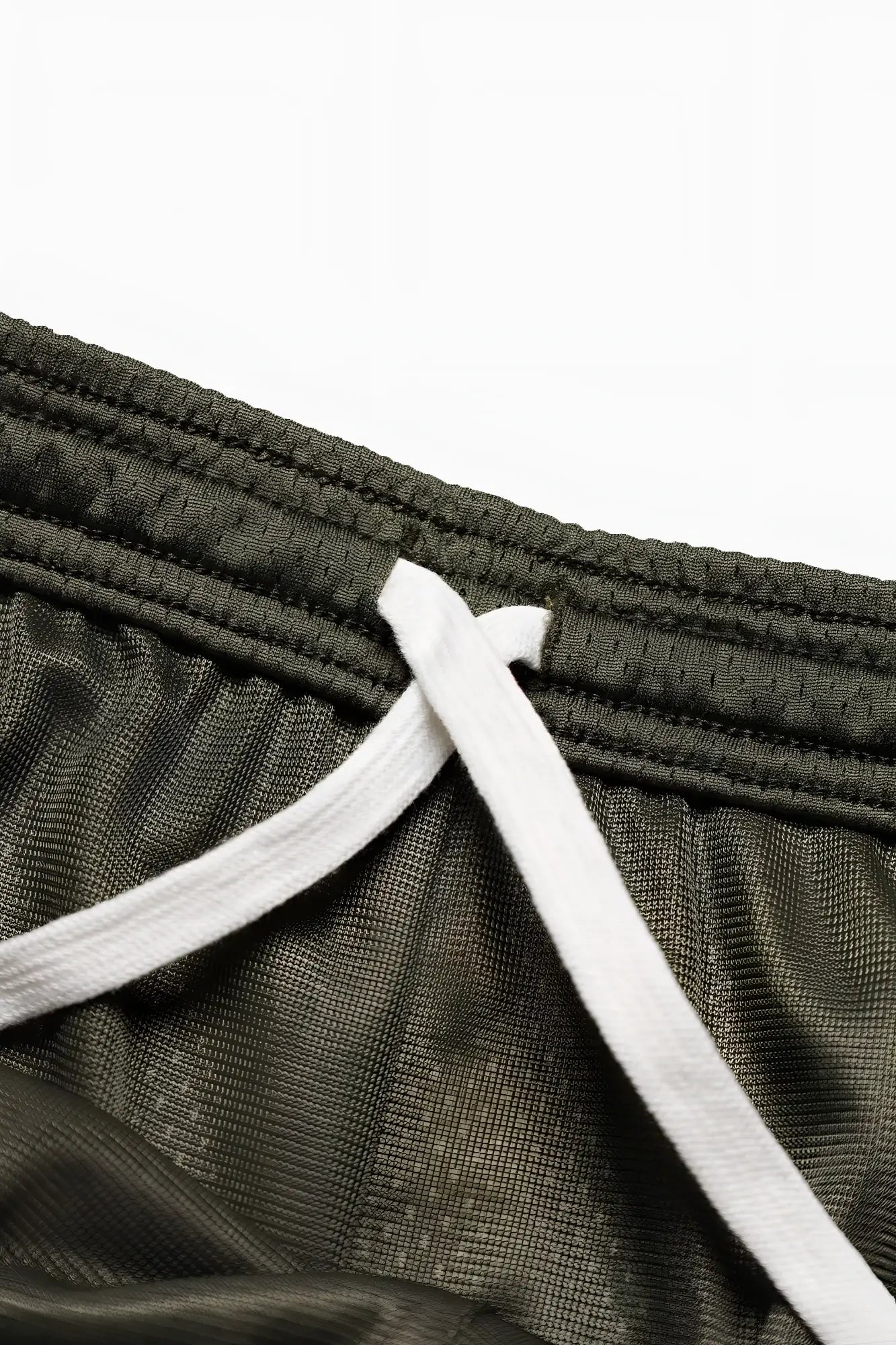 Jed North jersey mesh 7.5 inch gym shorts in olive with white drawstrings made of breathable mesh material