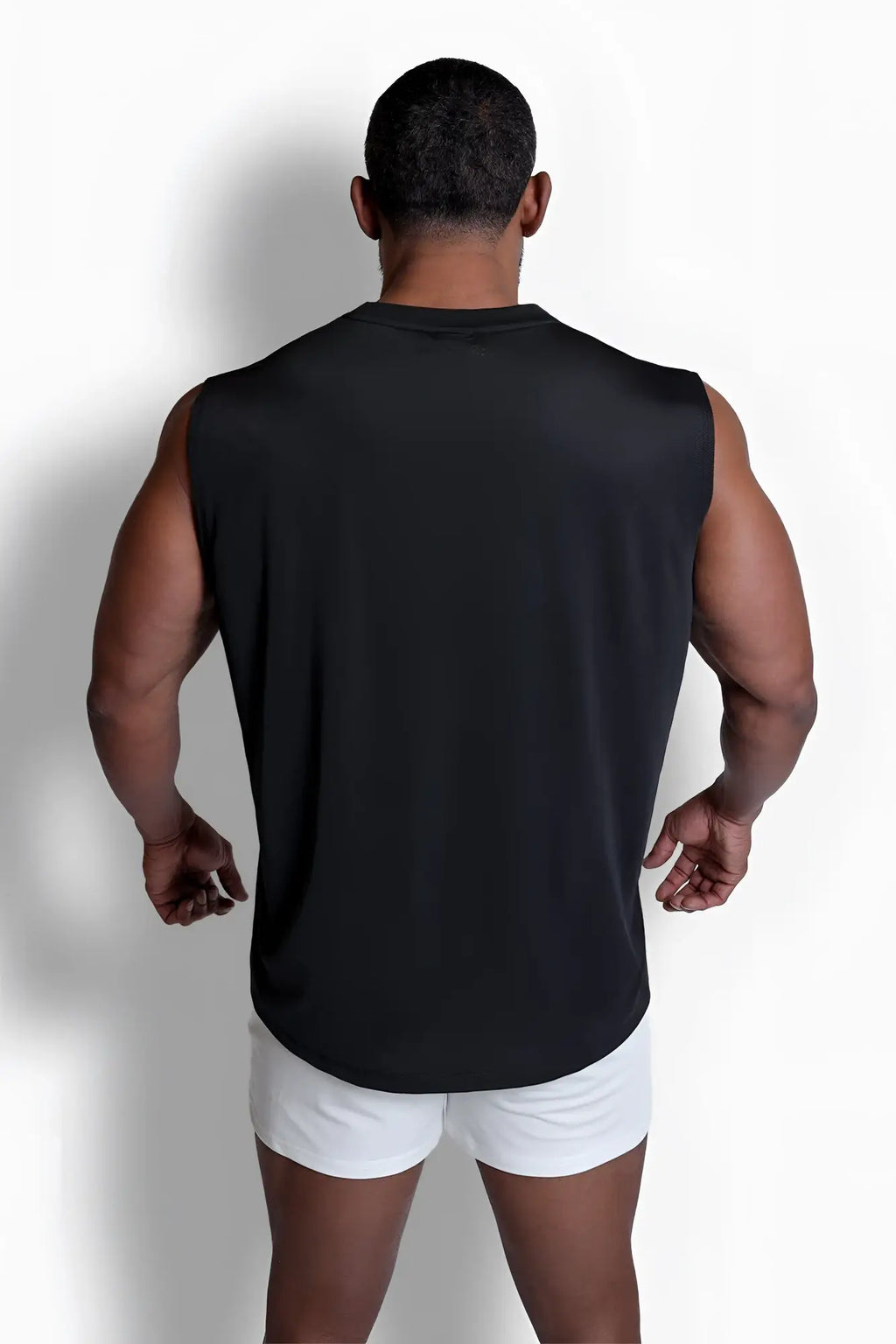 Black sleeveless athletic tank top with relaxed fit and rounded neckline designed for activewear use