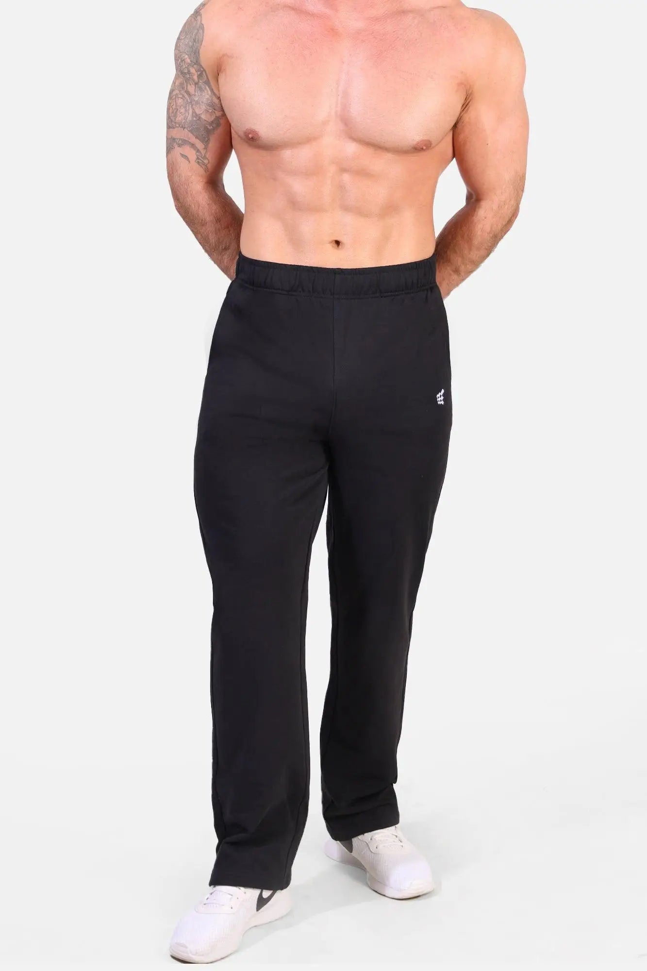 Jed North Lax straight cut joggers in black featuring a subtle white logo on the left thigh made from athletic fabric