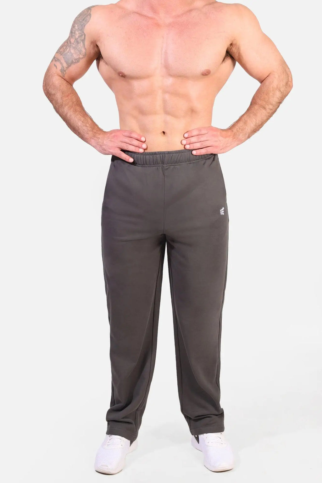 Jed North lax straight cut joggers in dark gray feature a subtle logo on the left thigh for athletic wear