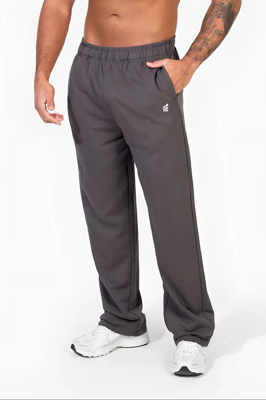 Dark gray jed north lax straight cut joggers with relaxed fit elastic waistband and small white logo on thigh