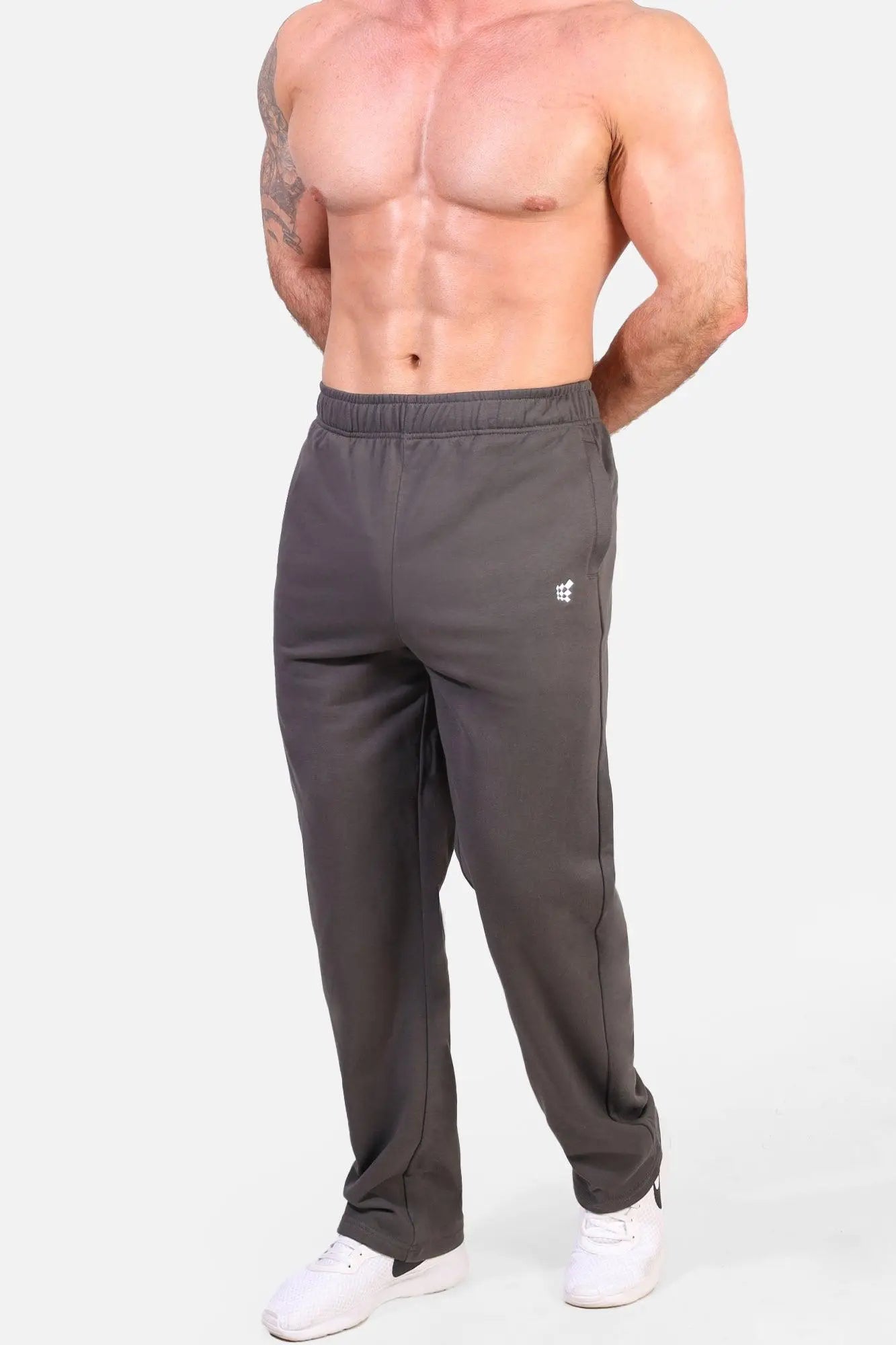 Jed North lax straight cut joggers are dark gray sweatpants with a small white logo on the left thigh