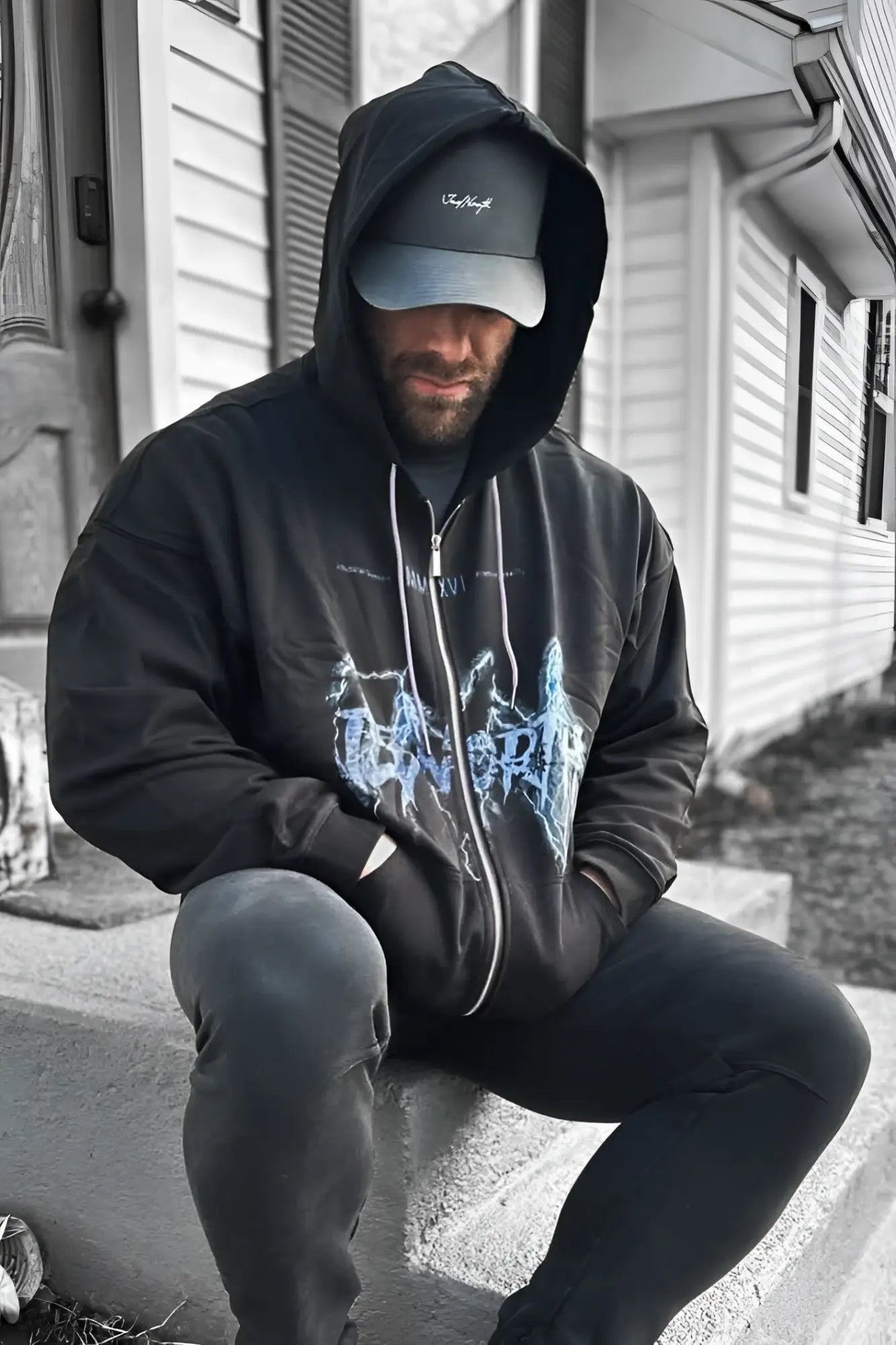 Limited edition black zip-up hoodie with blue lightning bolt graphic and white drawstrings for casual wear