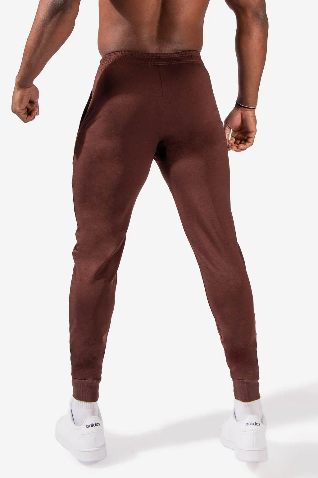 Brown jed north matrix tapered joggers with a snug fit and ribbed cuffs designed for athletic wear