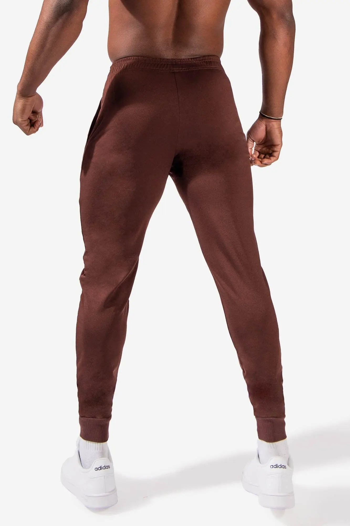 Brown jed north matrix tapered joggers with a snug fit and ribbed cuffs designed for athletic wear