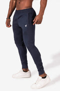 Navy blue jed north matrix tapered joggers featuring a subtle white logo on the thigh for athletic wear