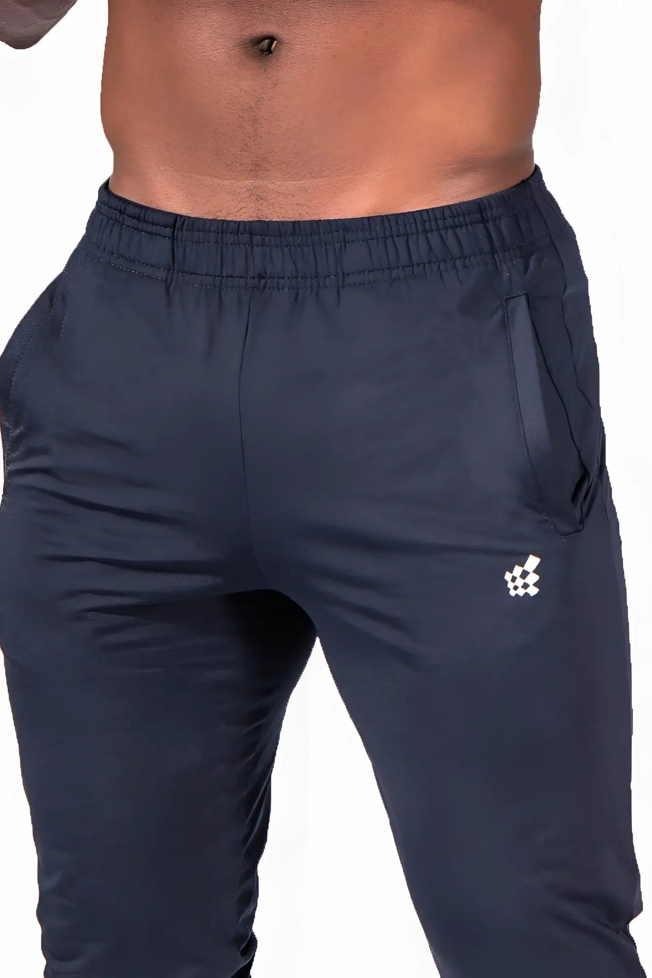 Navy jed north matrix tapered joggers with a white checkered logo on the lower right leg for athletic wear