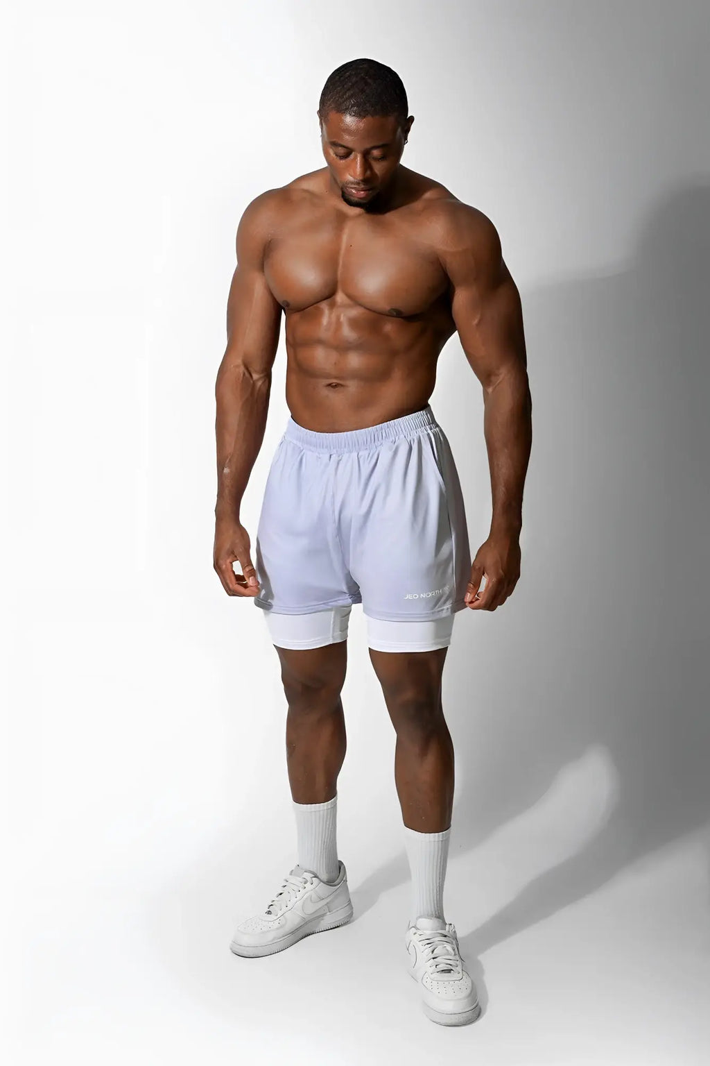 Jed North men’s 2-in-1 gym shorts in supernova silver featuring light blue and white two-tone athletic design with drawstring waistband