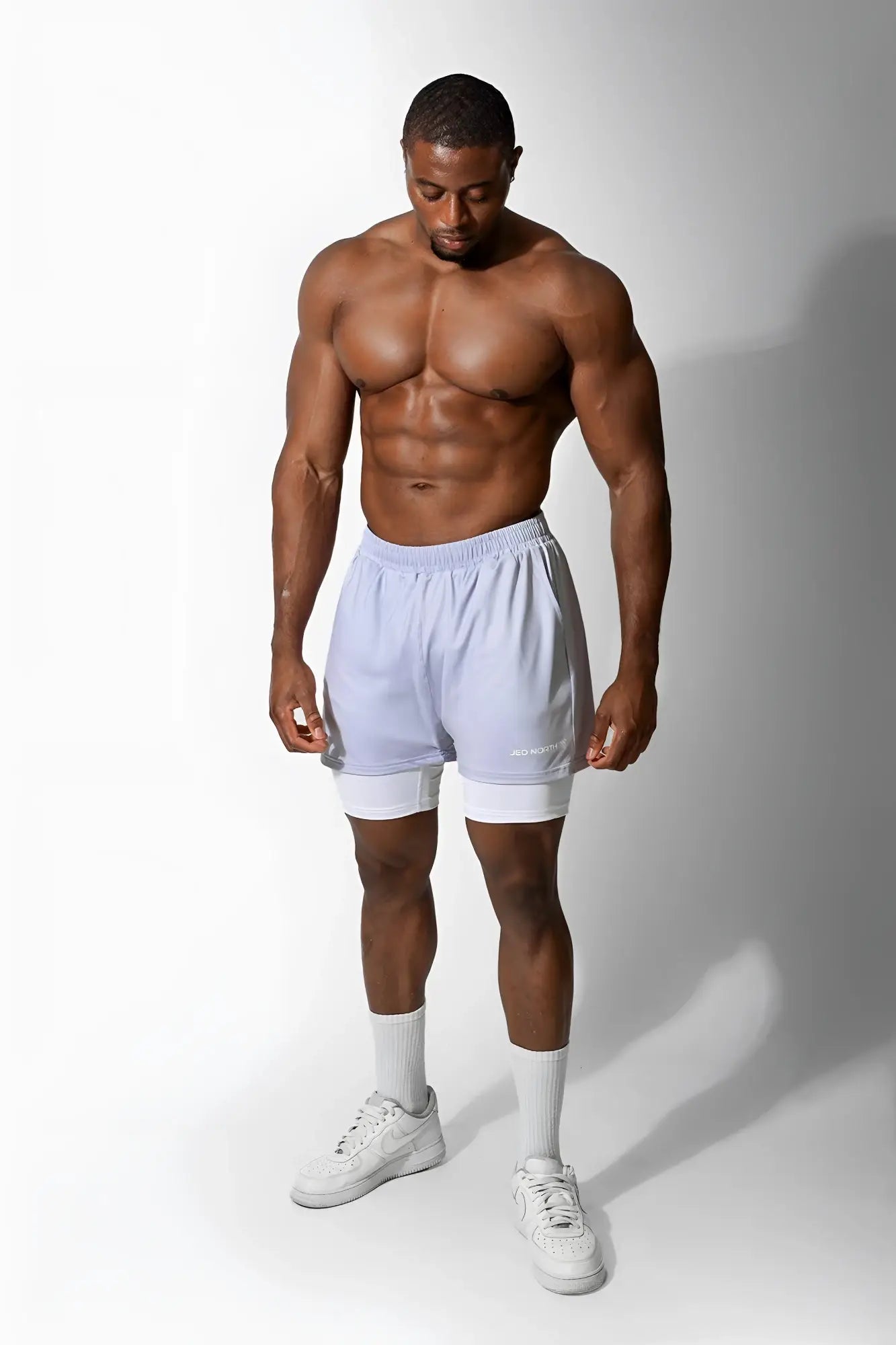 Jed North men’s 2-in-1 gym shorts in supernova silver featuring light blue and white two-tone athletic design with drawstring waistband