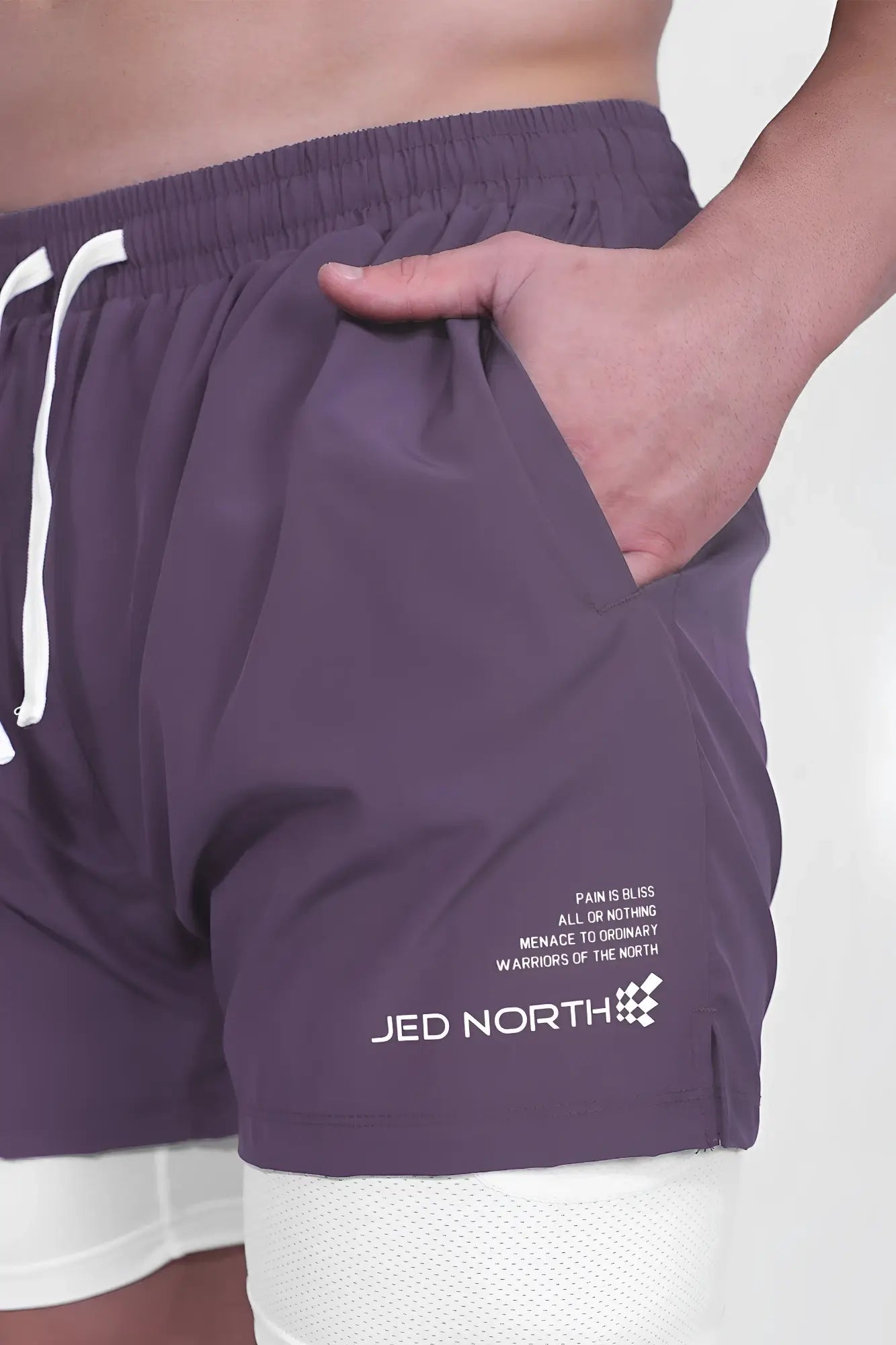 Jed north men’s 2-in-1 active 5 training shorts 2.0 in dark plum feature white drawstrings and a branded logo on lower leg