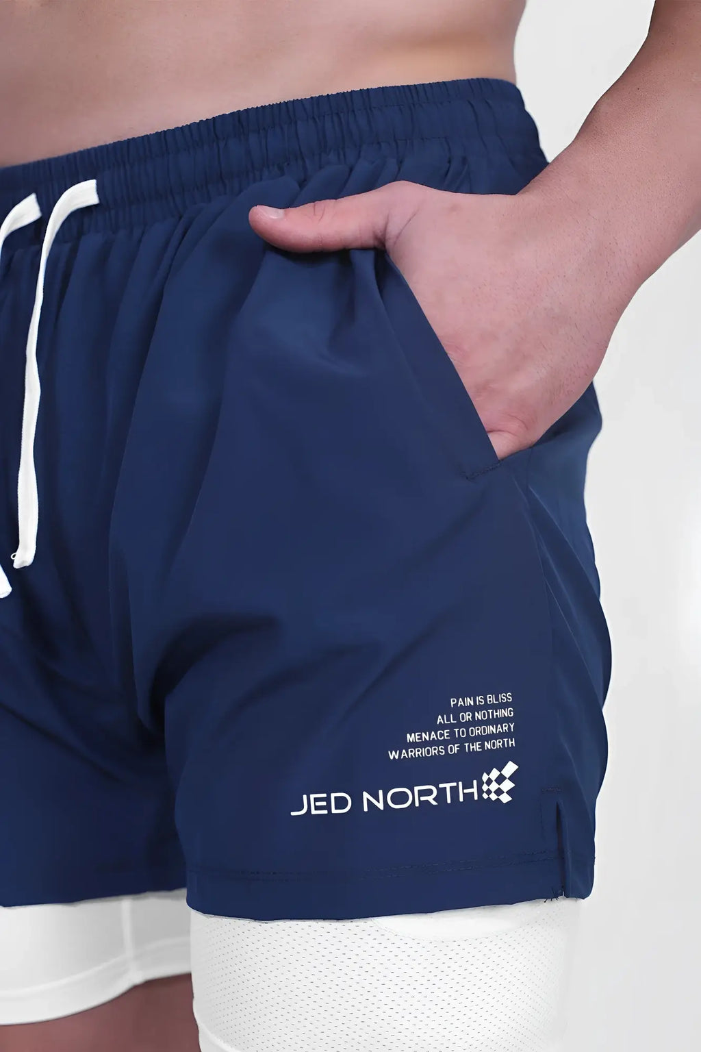 Navy blue jed north men’s 2-in-1 active 5 inch training shorts with white drawstrings and branded logo on lower leg